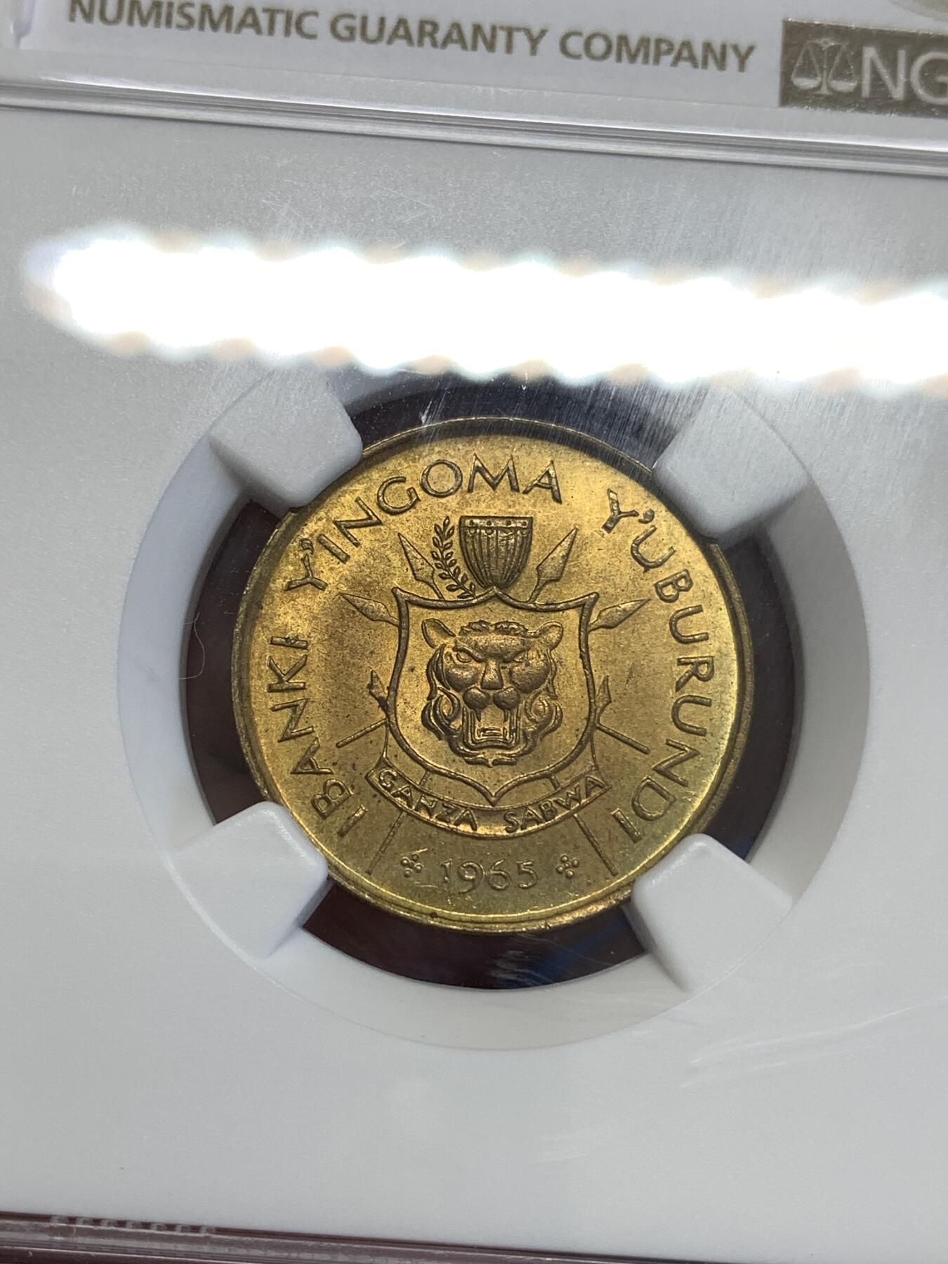 《竞宝斋》第294场- 周日，周一  2场连拍 （全场包邮） NGC MS64 1965 布隆迪1法郎 铜光充沛带淡彩 这个品种高分很难 64绝对可藏品相 非洲大热