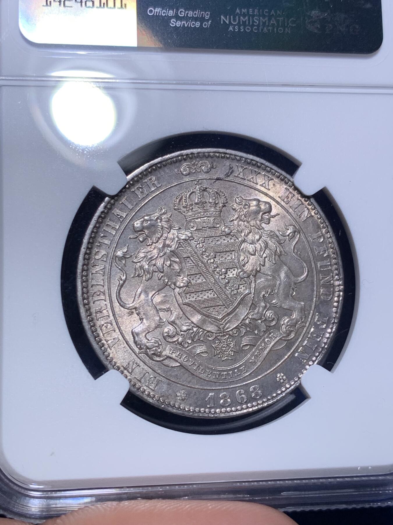 《竞宝斋》第294场- 周日，周一  2场连拍 （全场包邮） NGC MS62  德国 1868 萨克森 双狮流通1联合泰勒银币 紫罗兰包浆带十字光