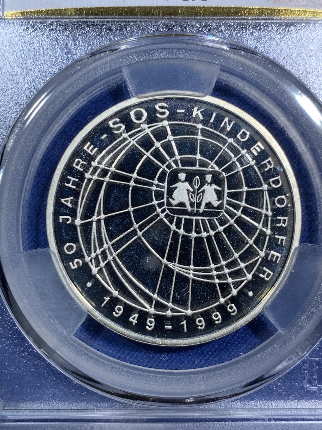 《竞宝斋》第294场- 周日，周一  2场连拍 （全场包邮） ACG PF67 德国1999年SOS儿童村50周年10马克精制银币 稀少德国纪念银币