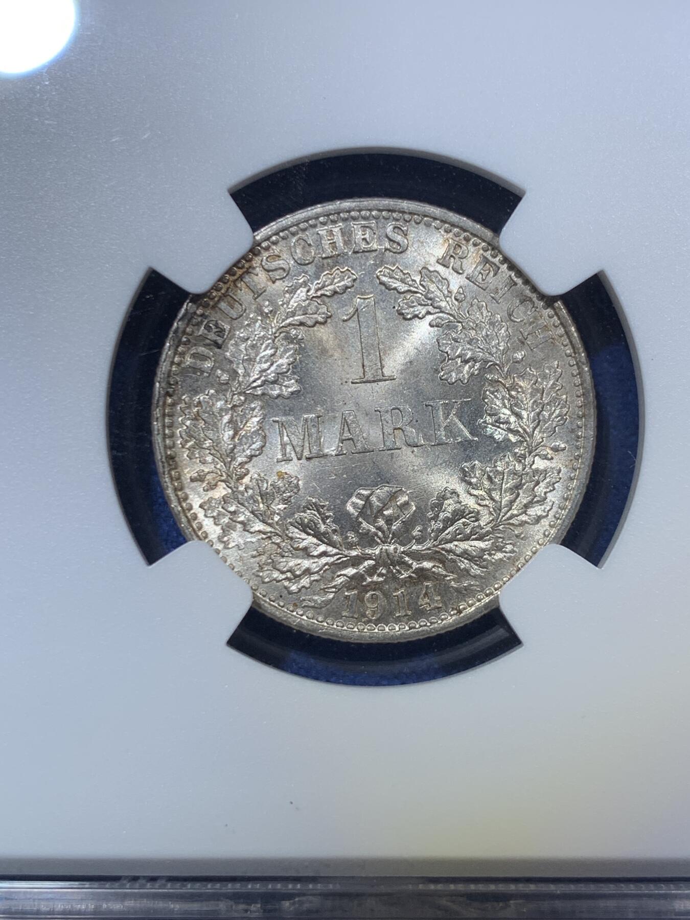 《竞宝斋》第294场- 周日，周一  2场连拍 （全场包邮） NGC-MS65 德国1914-F 1马克银币，转光特猛，浅黄油包浆，脱模剂依稀可见，出厂状态。