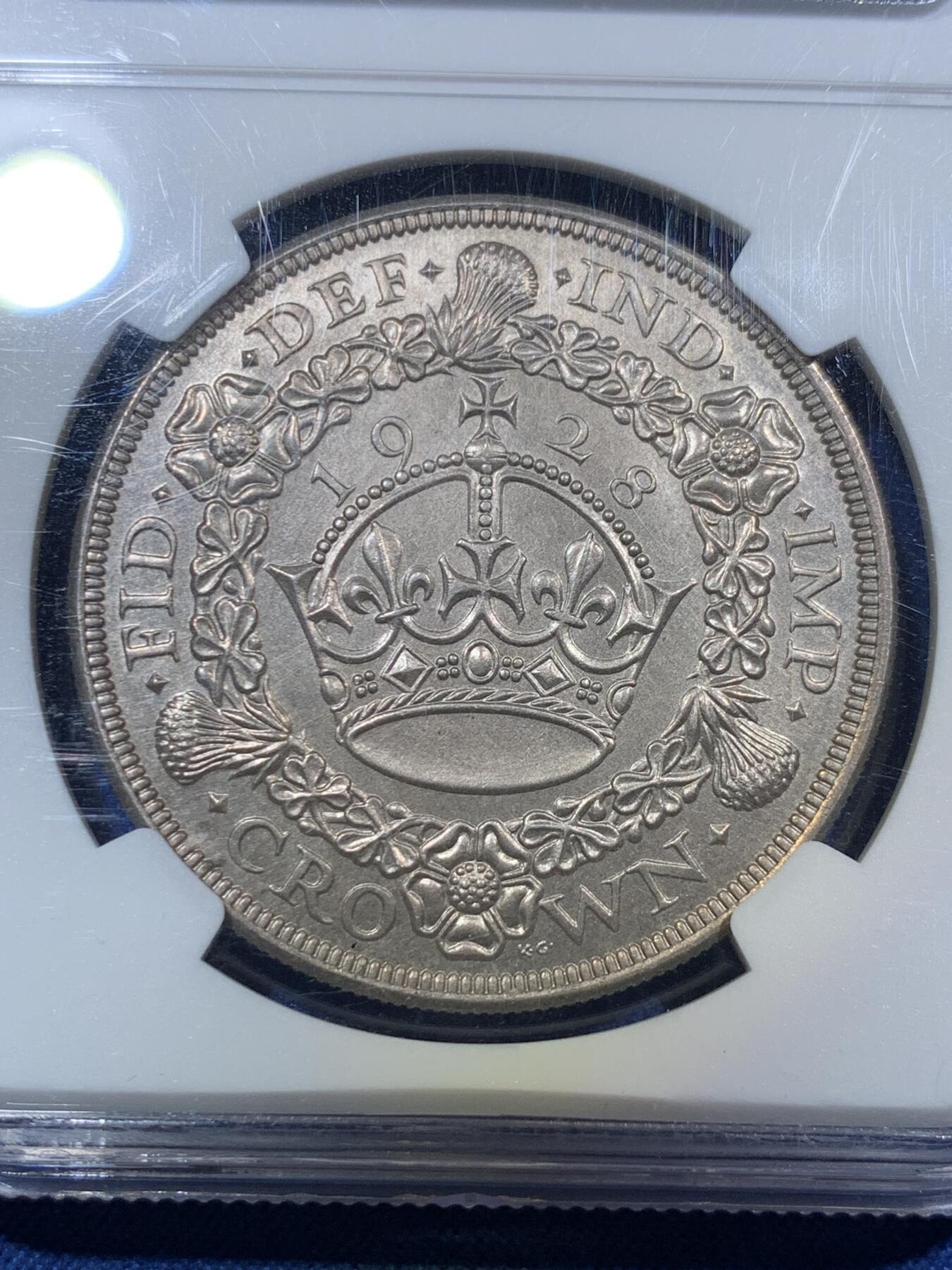 《竞宝斋》第294场- 周日，周一  2场连拍 （全场包邮） NGC MS63 英国1928年乔治五世花冠1克朗银币 发行9千多枚