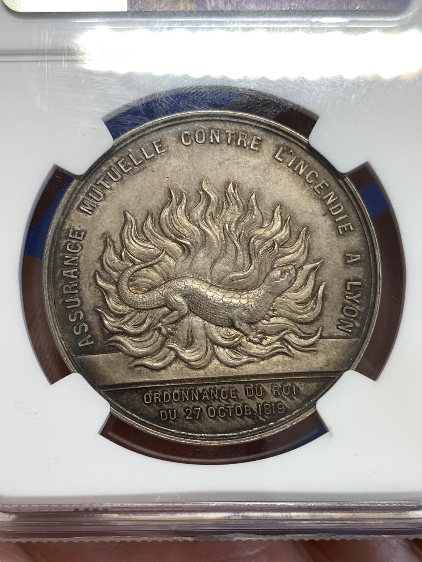 《竞宝斋》第294场- 周日，周一  2场连拍 （全场包邮） NGC MS64  1885年法国里昂火灾保险 首见品，双面图案精美绝伦，火蝾螈漂亮。值得收藏。直径36mm、重21.13克