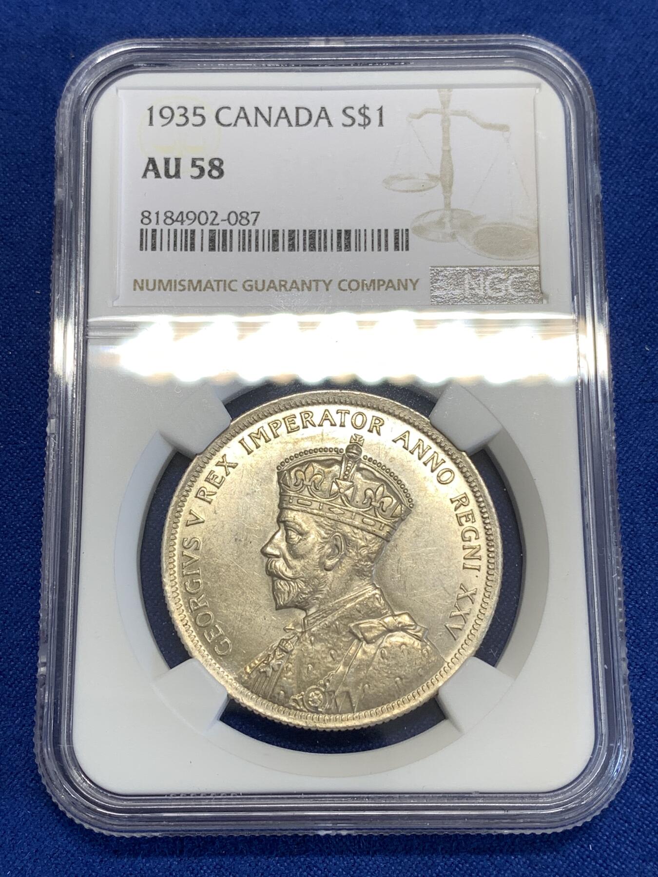 《竞宝斋》第294场- 周日，周一  2场连拍 （全场包邮） NGC AU58 英属加拿大1935年乔治五世1元划船大银币