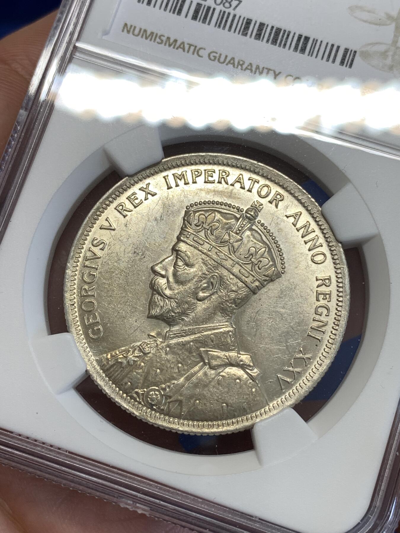 《竞宝斋》第294场- 周日，周一  2场连拍 （全场包邮） NGC AU58 英属加拿大1935年乔治五世1元划船大银币