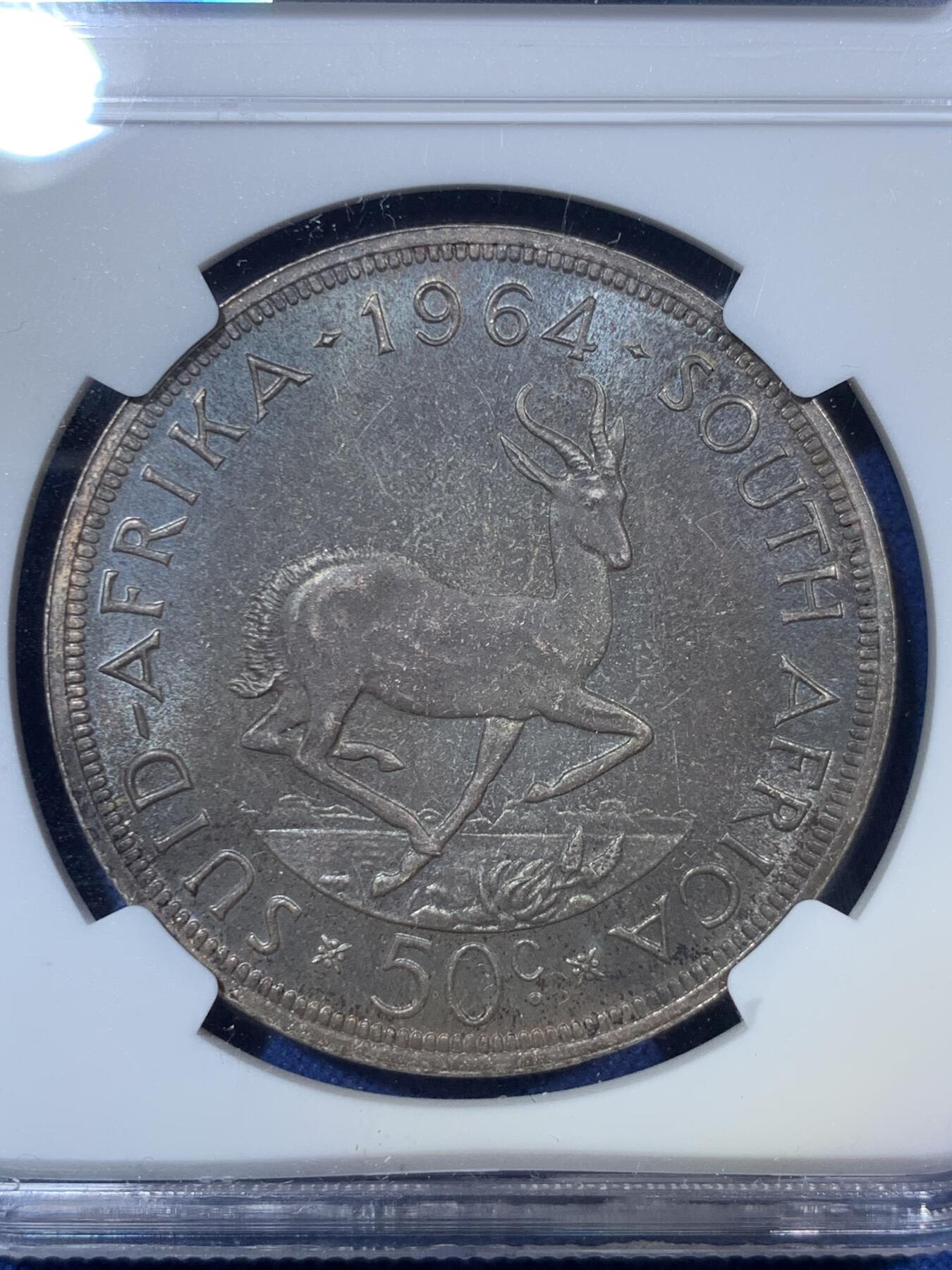 《竞宝斋》第294场- 周日，周一  2场连拍 （全场包邮） NGC MS62 南非1964年吕贝克跳羚50分大银币 炫五彩包浆