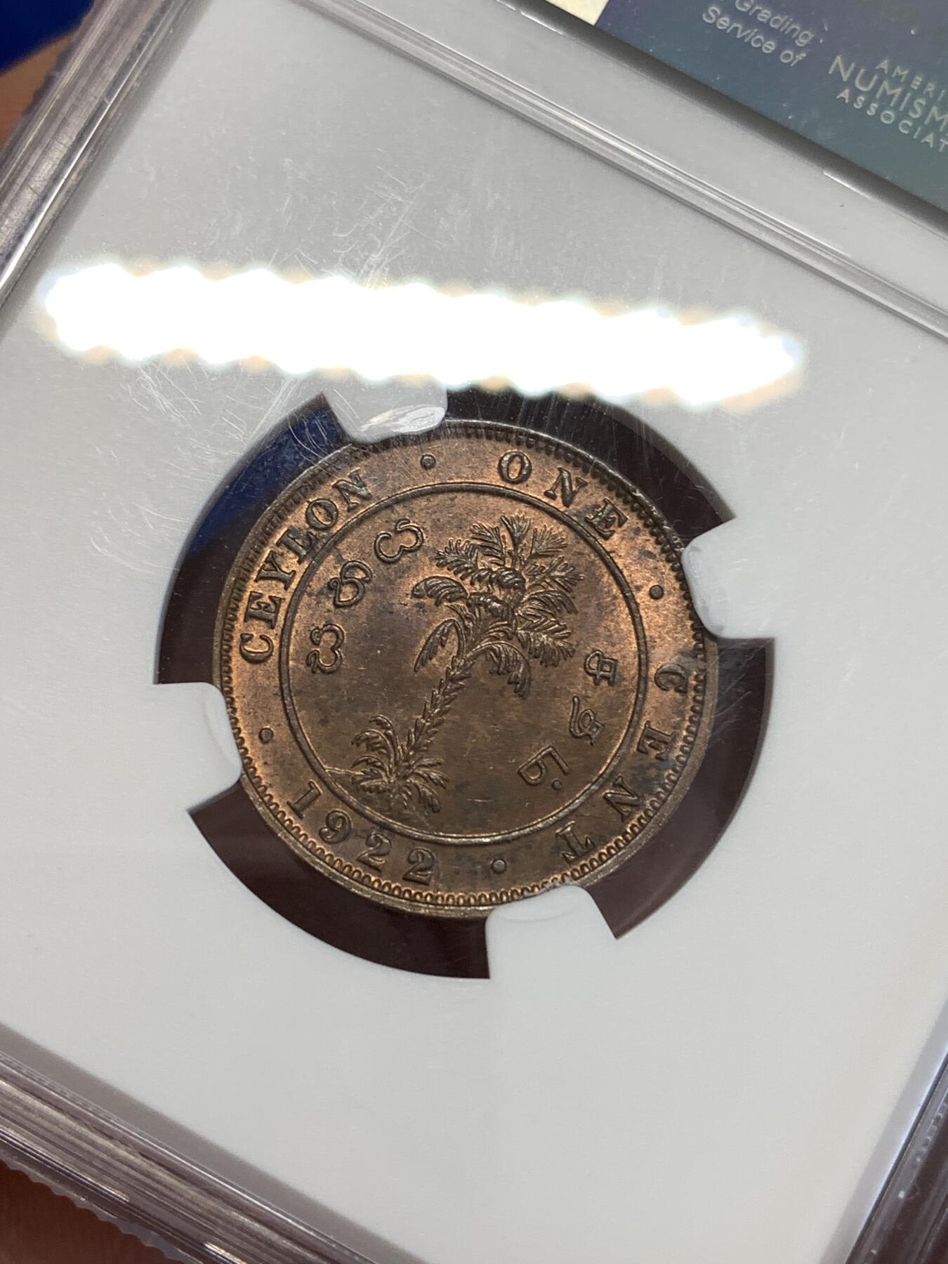 《竞宝斋》第294场- 周日，周一  2场连拍 （全场包邮） NGC MS63RB 少见！1922锡兰1分 早期锡兰 乔五的好品非常少 这枚两面包浆均匀 铜色红润 非常漂亮