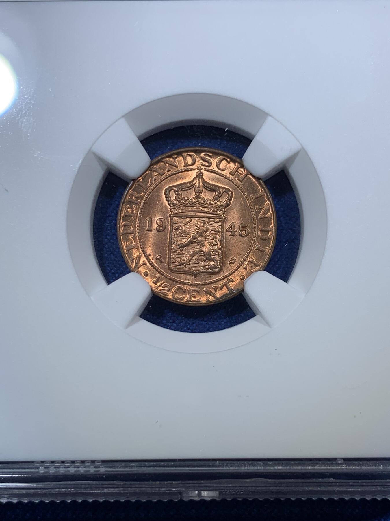 《竞宝斋》第294场- 周日，周一  2场连拍 （全场包邮） NGC MS65RB 荷属东印度1945P厂1/2分铜币 gem出厂状态，完美无瑕，铜光动人