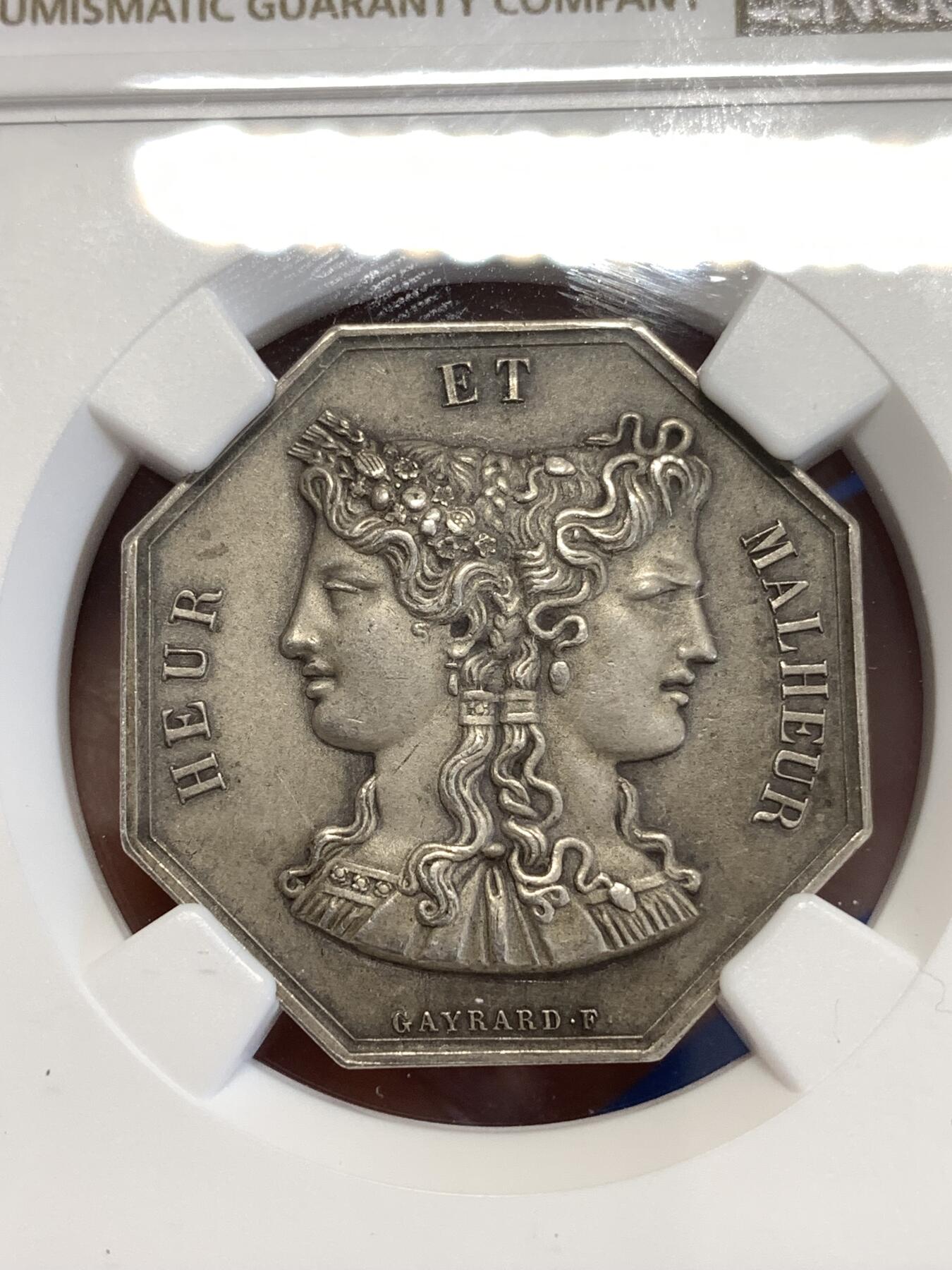 《竞宝斋》第294场- 周日，周一  2场连拍 （全场包邮） NGC MS63 法国双面神系列赌博游戏八角银质代币 铭文：旅程越奇幻，她就越快乐。直径30mm，重13.64克