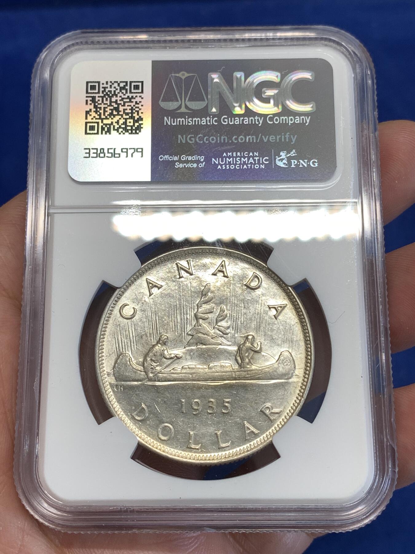 《竞宝斋》第294场- 周日，周一  2场连拍 （全场包邮） NGC AU58 英属加拿大1935年乔治五世1元划船大银币