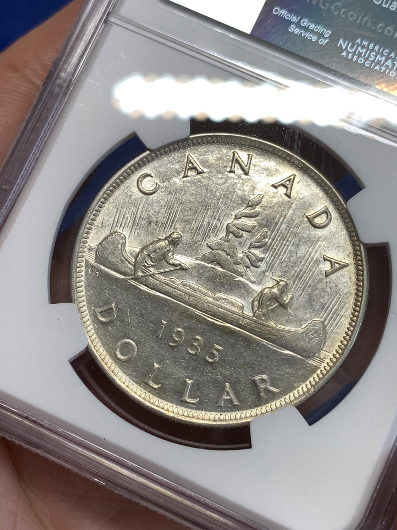 《竞宝斋》第294场- 周日，周一  2场连拍 （全场包邮） NGC AU58 英属加拿大1935年乔治五世1元划船大银币