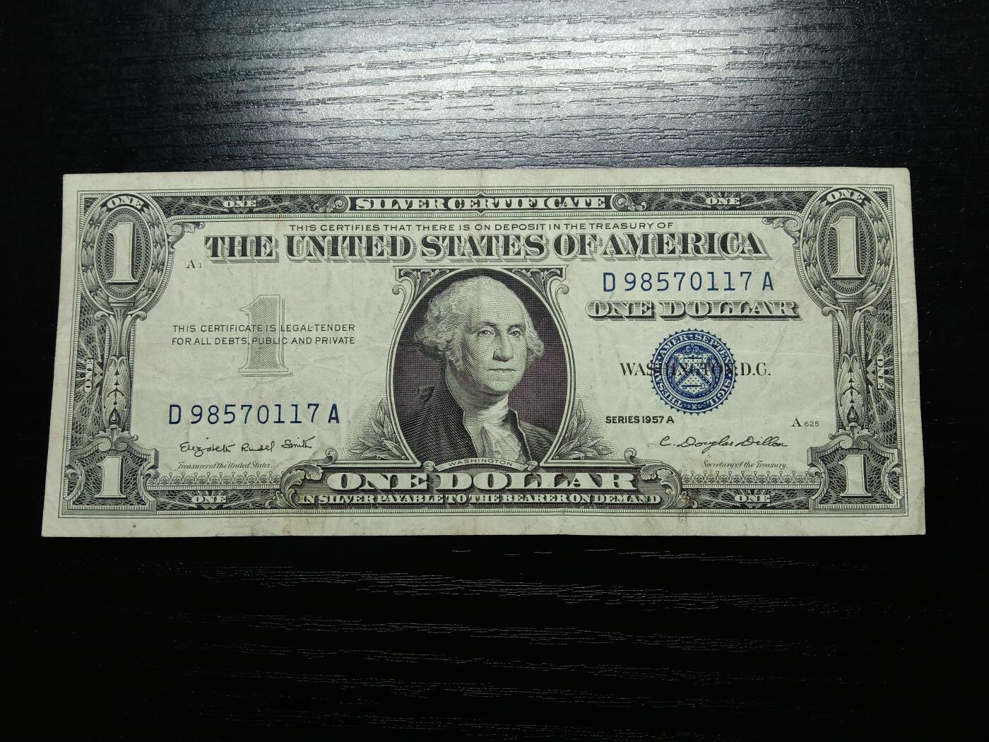 博彦收藏9月11日钱币专场 美国1957A版蓝库银元劵一元 流通好品