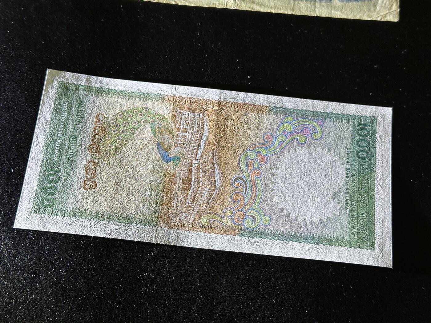 《外钞收藏家》第三百九十九期 1987年斯里兰卡100卢比 疑似有软折