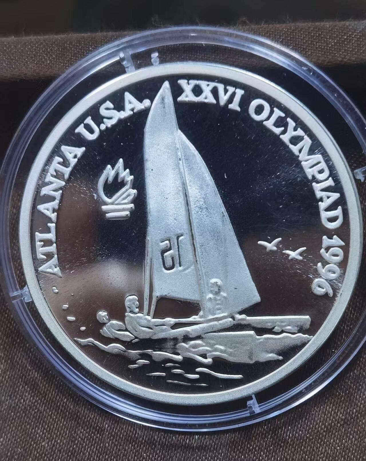 北京马甸外国币专卖微拍第124期，外国金银币专场，陆续上新，欢迎关注 1996年罗马尼亚纪念亚特兰大奥运会银币，重27克925银