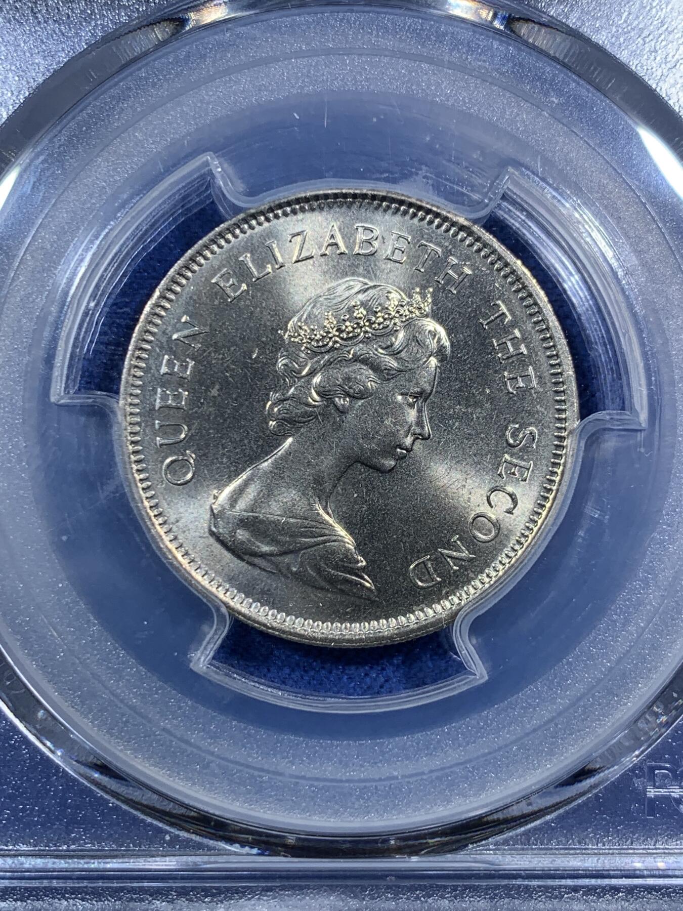 《竞宝斋》第295场- 周日，周一  2场连拍 （全场包邮） PCGS MS66 1979 香港 一圆 卷拆送评 超高分难得 两面都有类镜面效果 转光非常犀利