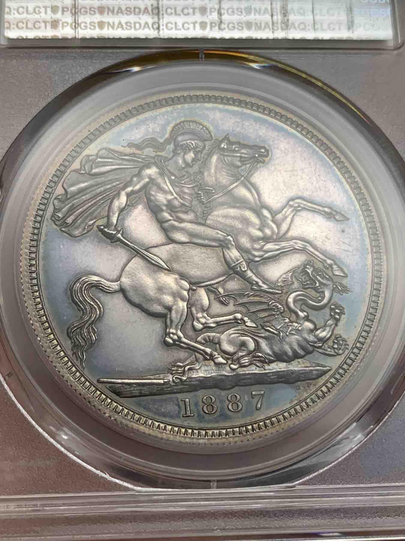 《竞宝斋》第295场- 周日，周一  2场连拍 （全场包邮） PCGS PR62CAM 英国1887年维多利亚1克朗马剑精制银币 蓝汪汪的底板，镜面效果明显，只有1000枚左右，大名誉品，英系资深玩家必备藏品