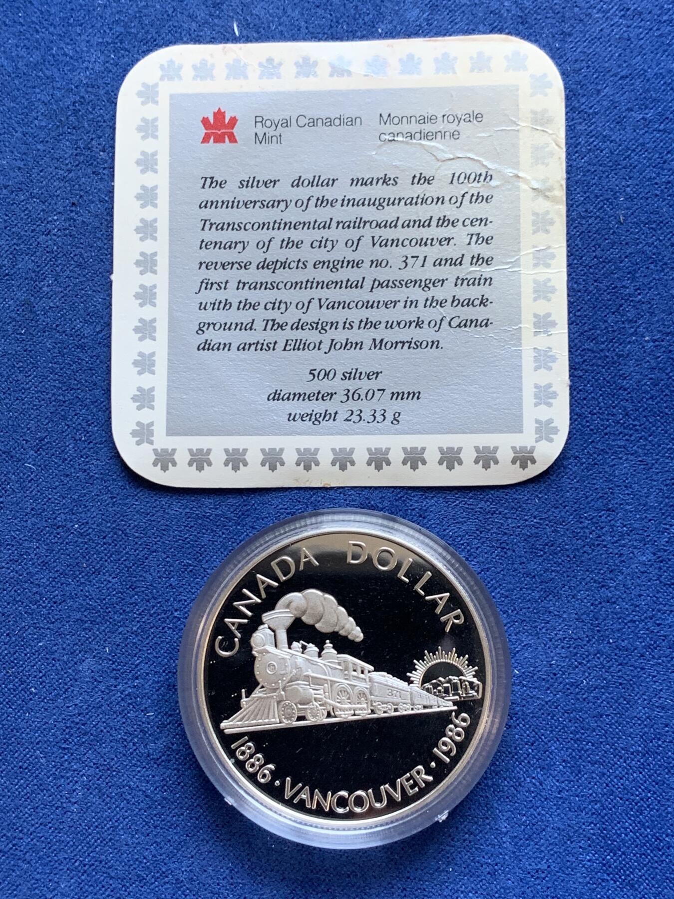 《竞宝斋》第295场- 周日，周一  2场连拍 （全场包邮） 加拿大1986年温哥华百年纪念银币 正面伊丽莎白二世 背面火车 带盒证