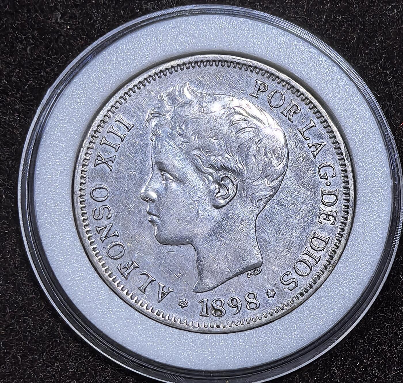 北京马甸外国币专卖微拍第124期，外国金银币专场，陆续上新，欢迎关注 1989年西班牙5比塞塔双柱银币，这个品种相对较少而且品相好的更少