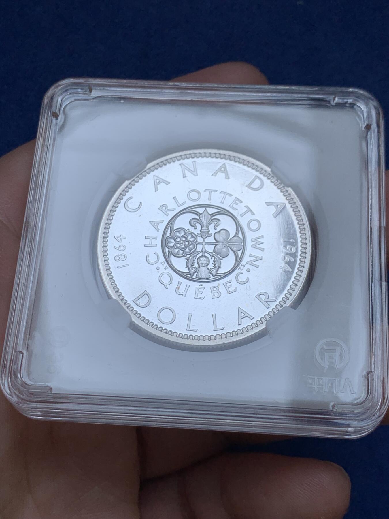 《竞宝斋》第295场- 周日，周一  2场连拍 （全场包邮） 加拿大1964年夏洛特敦百年一元纪念银币 类精制 品相如图