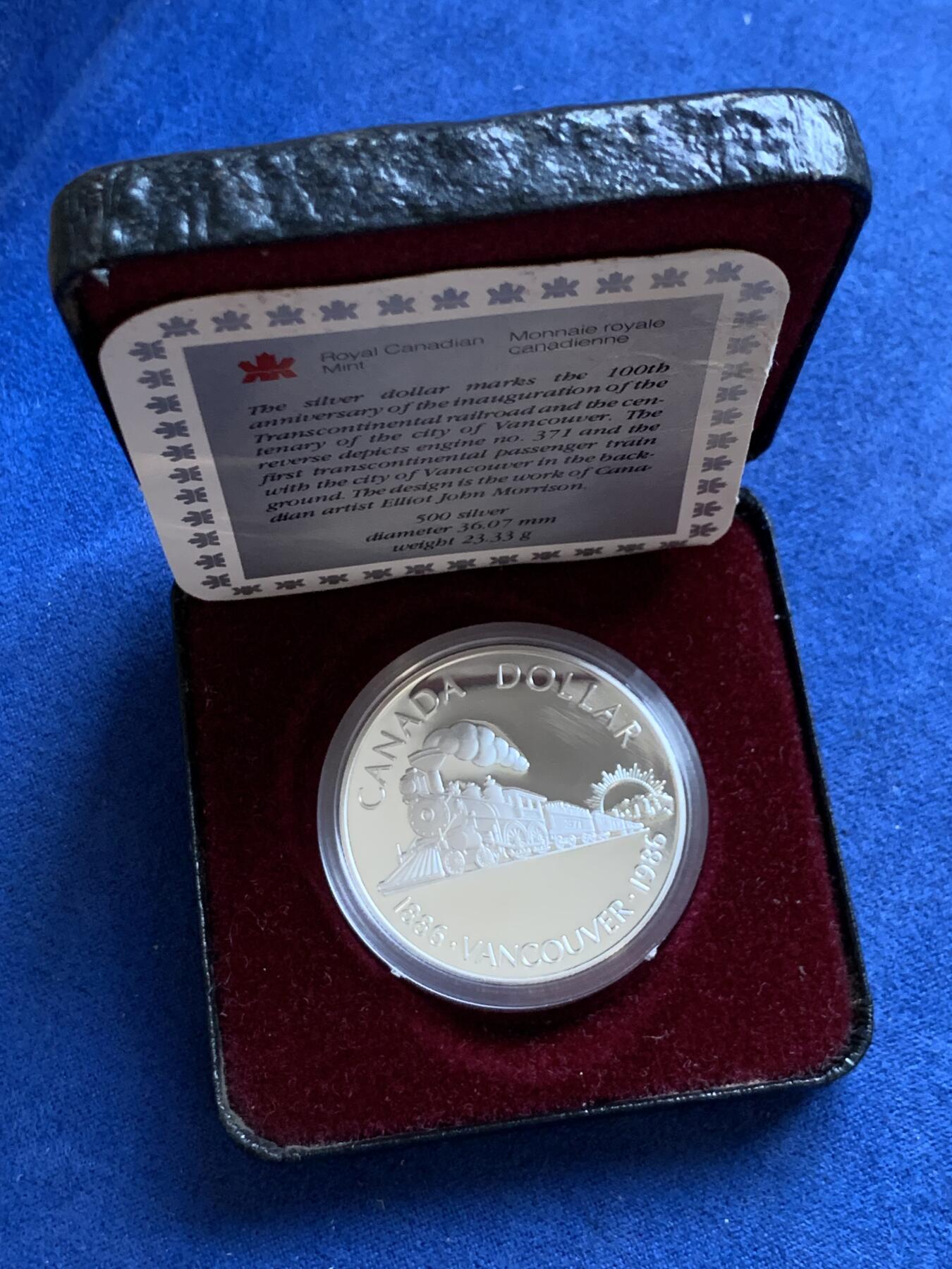 《竞宝斋》第295场- 周日，周一  2场连拍 （全场包邮） 加拿大1986年温哥华百年纪念银币 正面伊丽莎白二世 背面火车 带盒证
