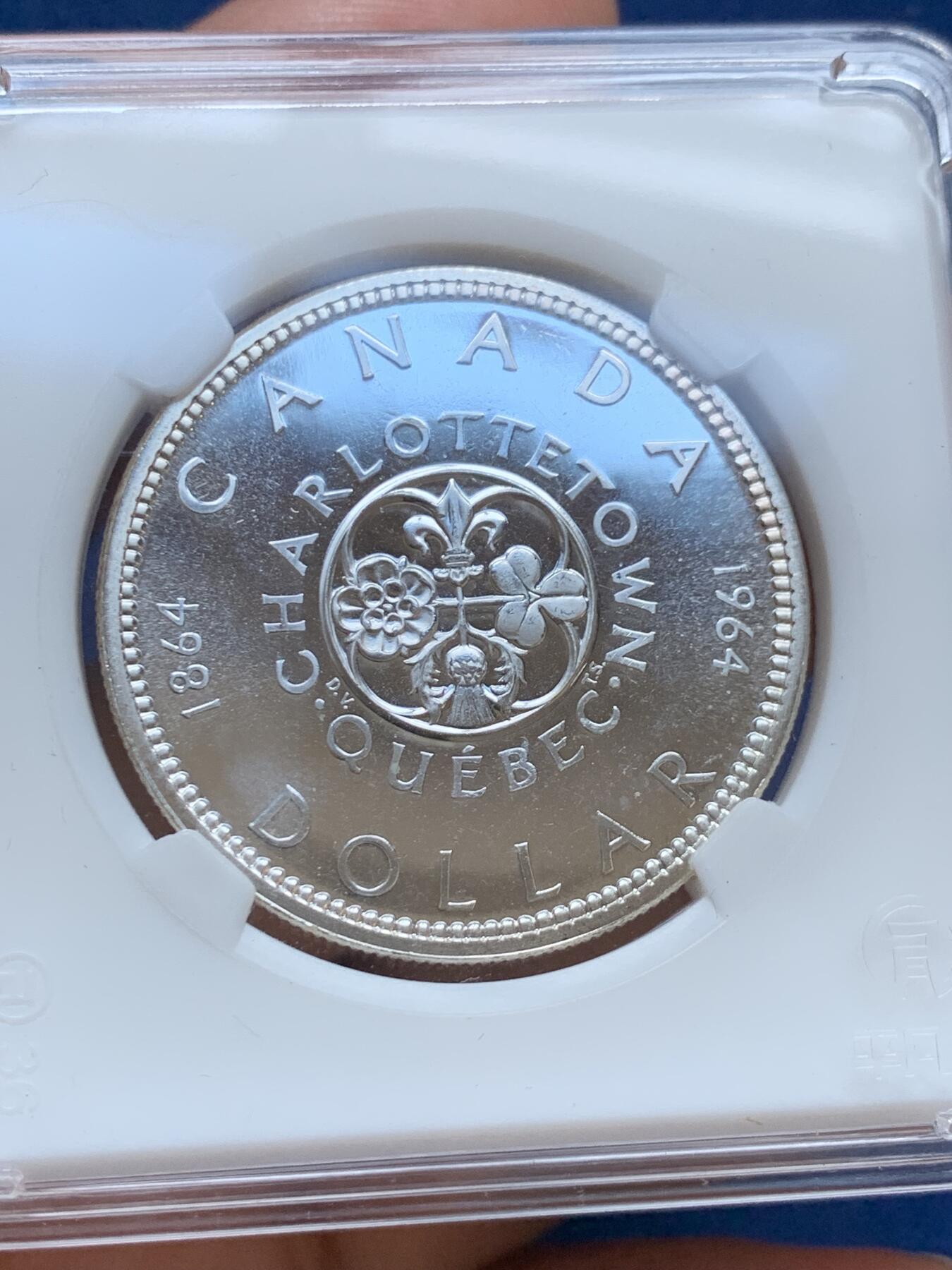 《竞宝斋》第295场- 周日，周一  2场连拍 （全场包邮） 加拿大1964年夏洛特敦百年一元纪念银币 类精制 品相如图