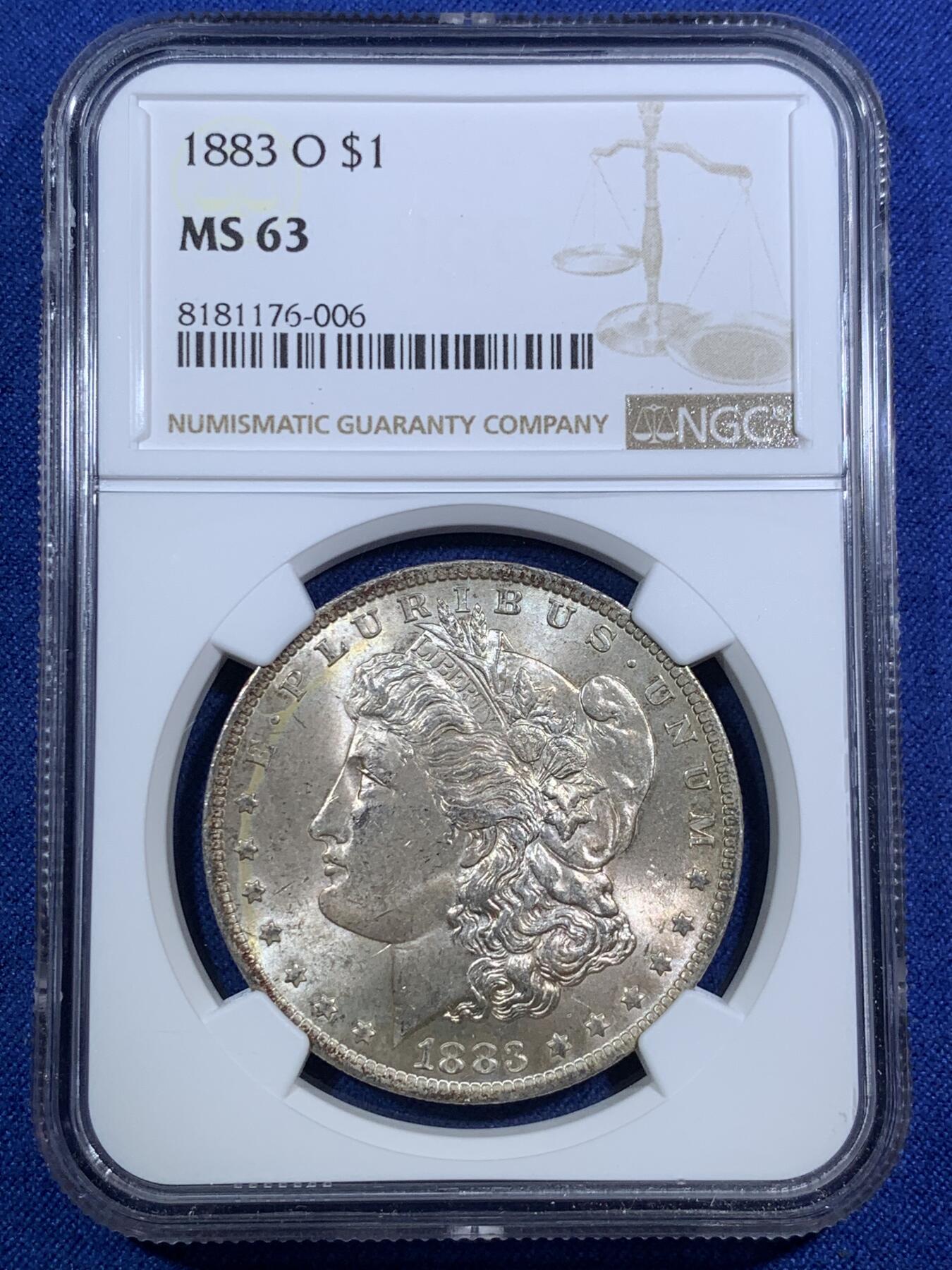 《竞宝斋》第295场- 周日，周一  2场连拍 （全场包邮） NGC MS63 美国1883年O版摩根银币 黄油包浆 光度十足  正面小环彩