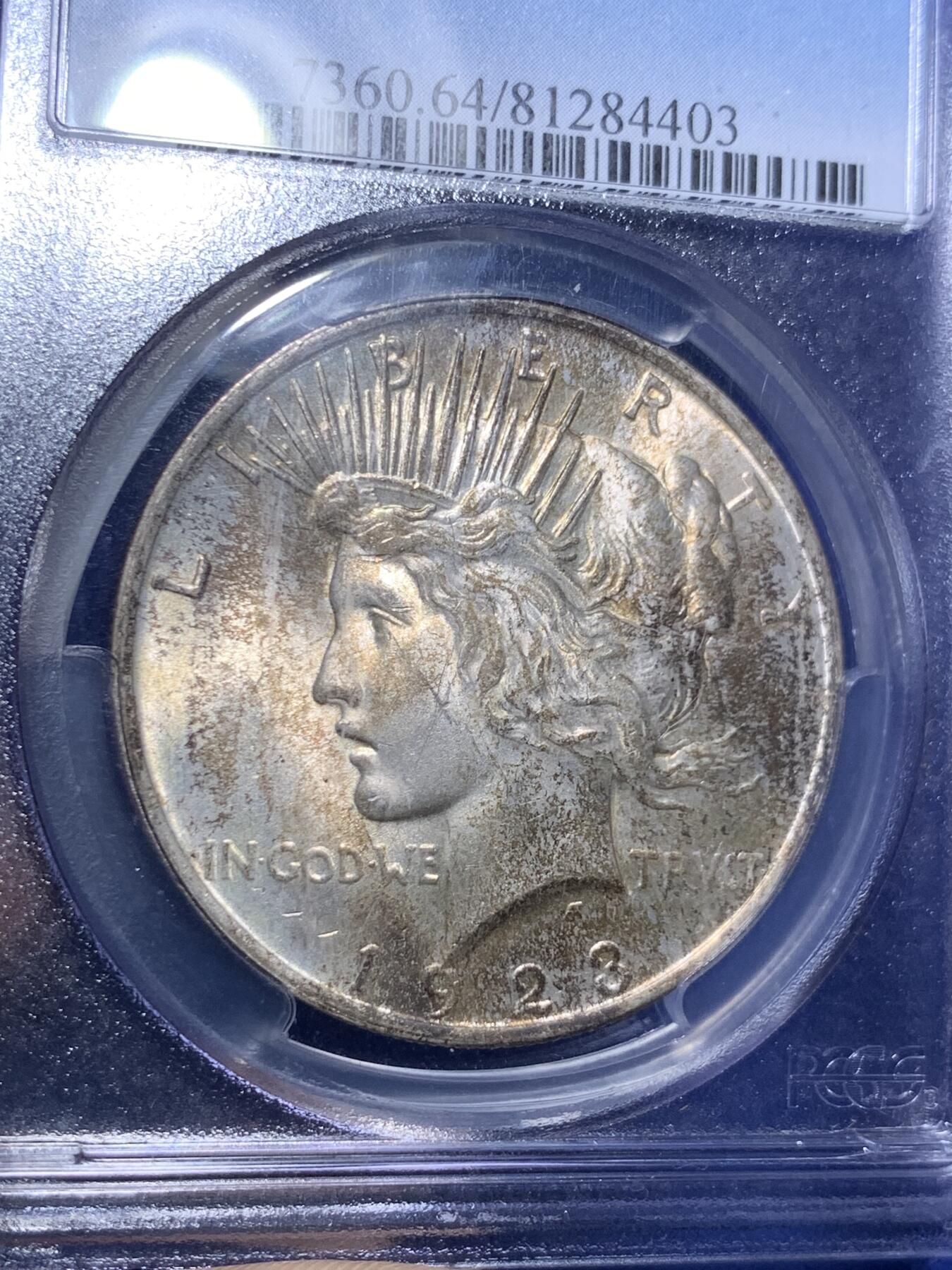 《竞宝斋》第295场- 周日，周一  2场连拍 （全场包邮） PCGS MS64 美国1923年和平银元 原汁原味淡彩老包浆，包浆醇厚润泽又犀利，币面清爽干净又漂亮，盒子背面支撑小磕