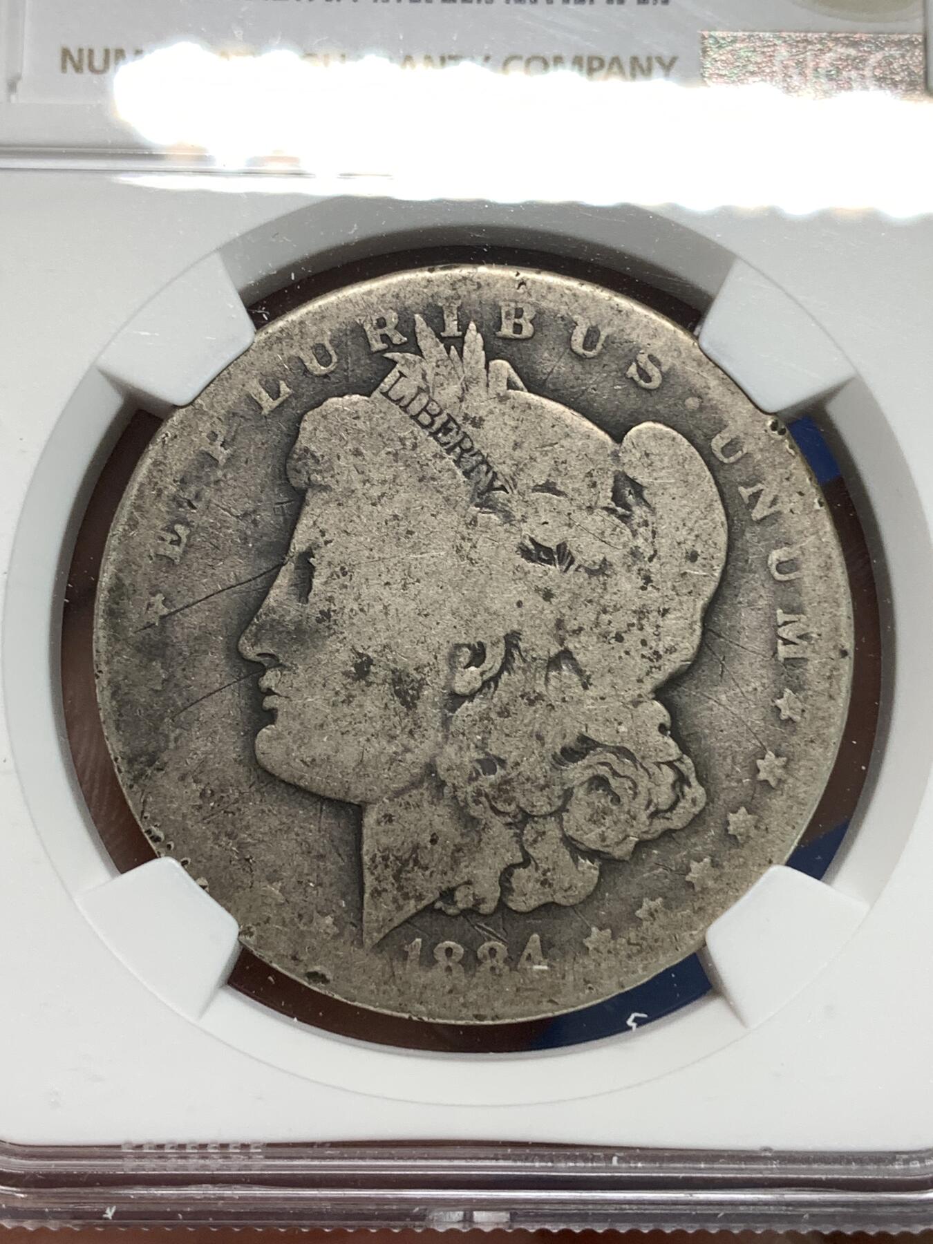 《竞宝斋》第295场- 周日，周一  2场连拍 （全场包邮） NGC G 美国1884-O摩根一元银币 少见充分流通品相，可惜严评，美国玩摩根充分流通很受欢迎