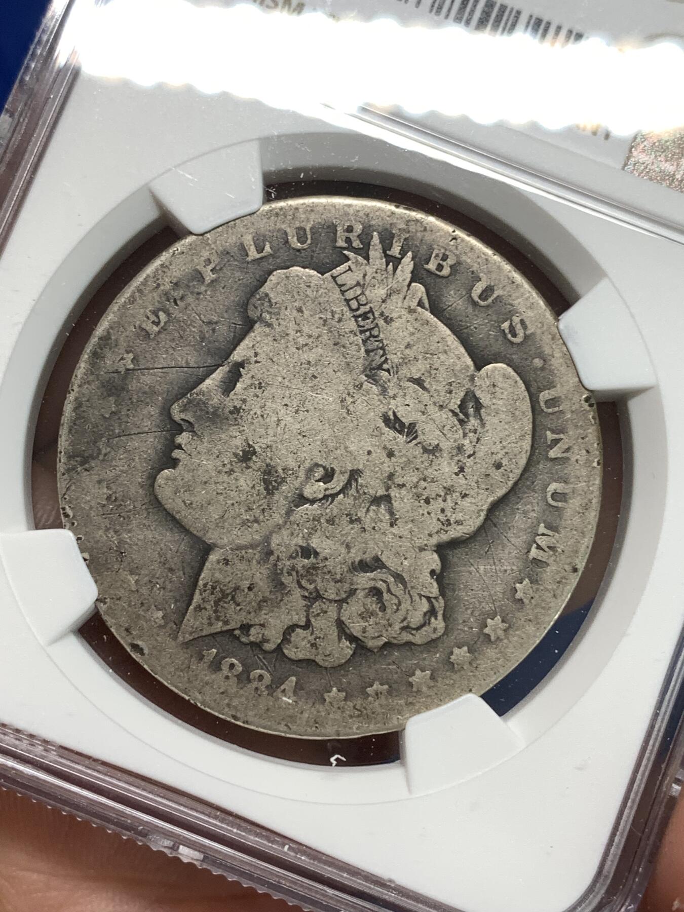 《竞宝斋》第295场- 周日，周一  2场连拍 （全场包邮） NGC G 美国1884-O摩根一元银币 少见充分流通品相，可惜严评，美国玩摩根充分流通很受欢迎