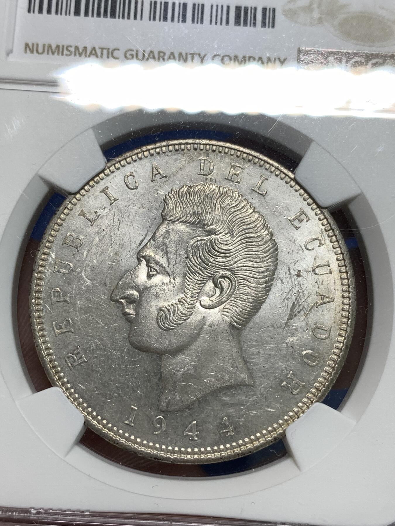 《竞宝斋》第295场- 周日，周一  2场连拍 （全场包邮） NGC MS60 厄瓜多尔1944年5苏克雷克朗大银币 背面带棕灰色包浆 正面转光好