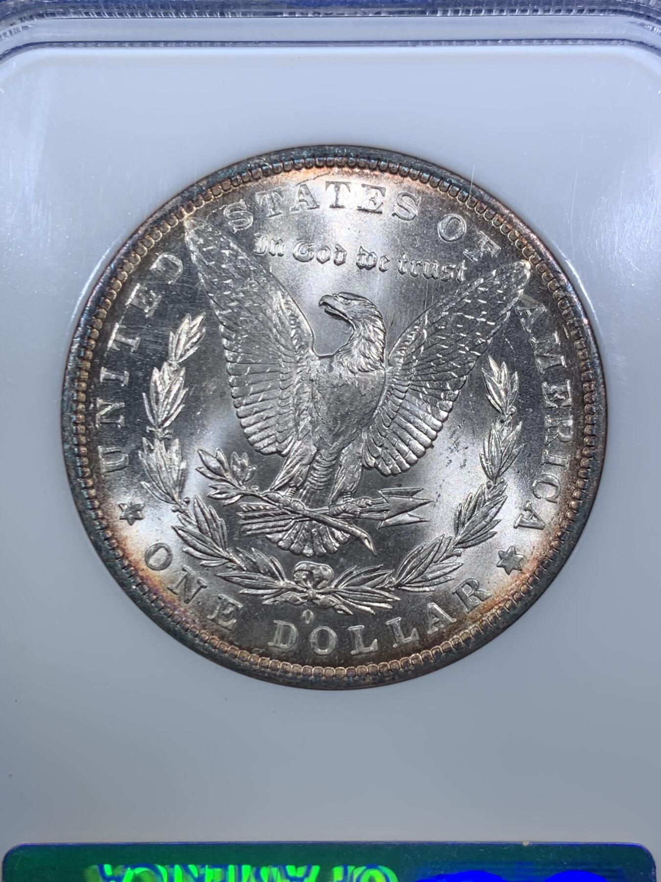 《竞宝斋》第295场- 周日，周一  2场连拍 （全场包邮） NGC MS65 老盒美国 1883-O 摩根银币 蓝金彩非常漂亮