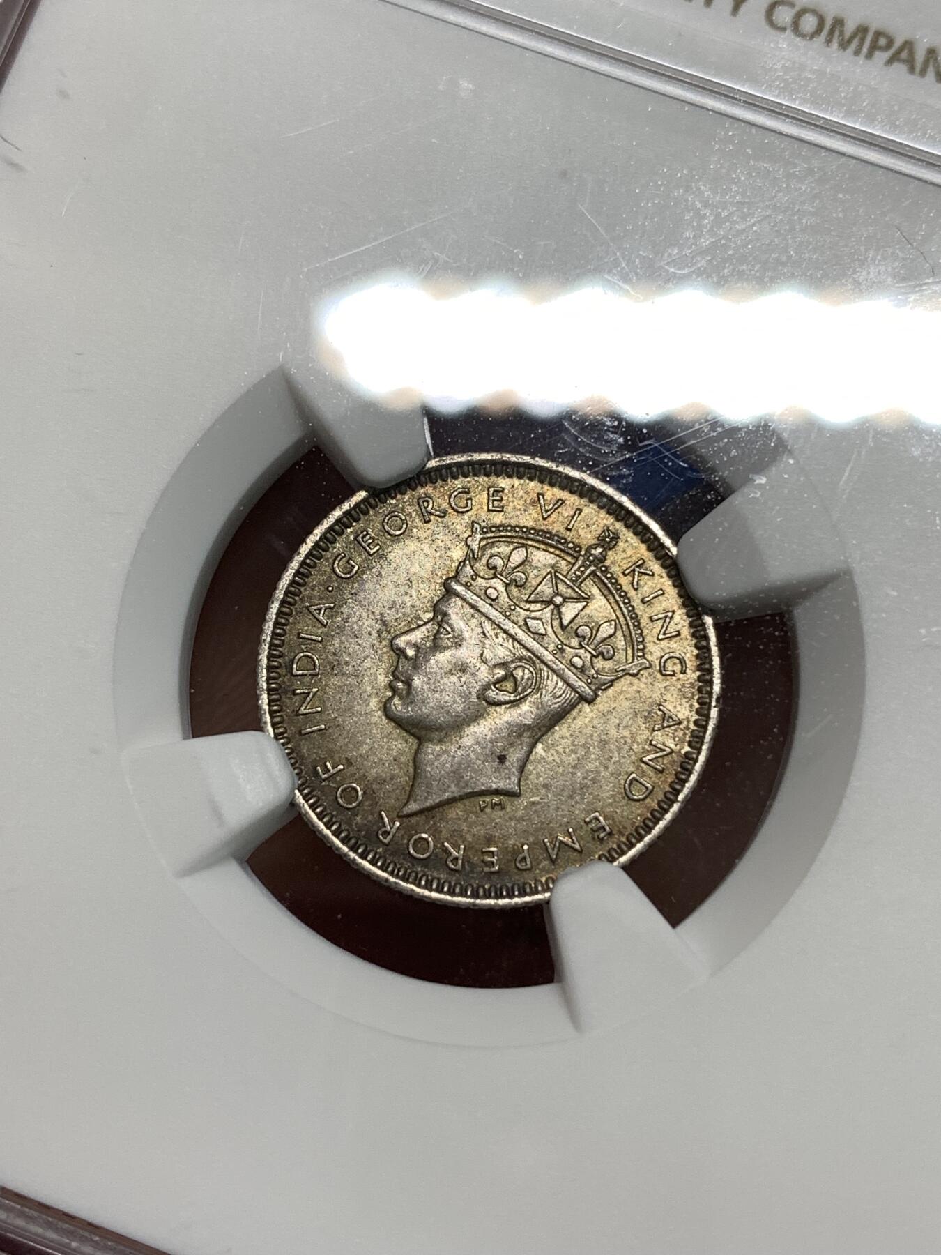 《竞宝斋》第295场- 周日，周一  2场连拍 （全场包邮） NGC MS63 英属马来亚1941年10分银币