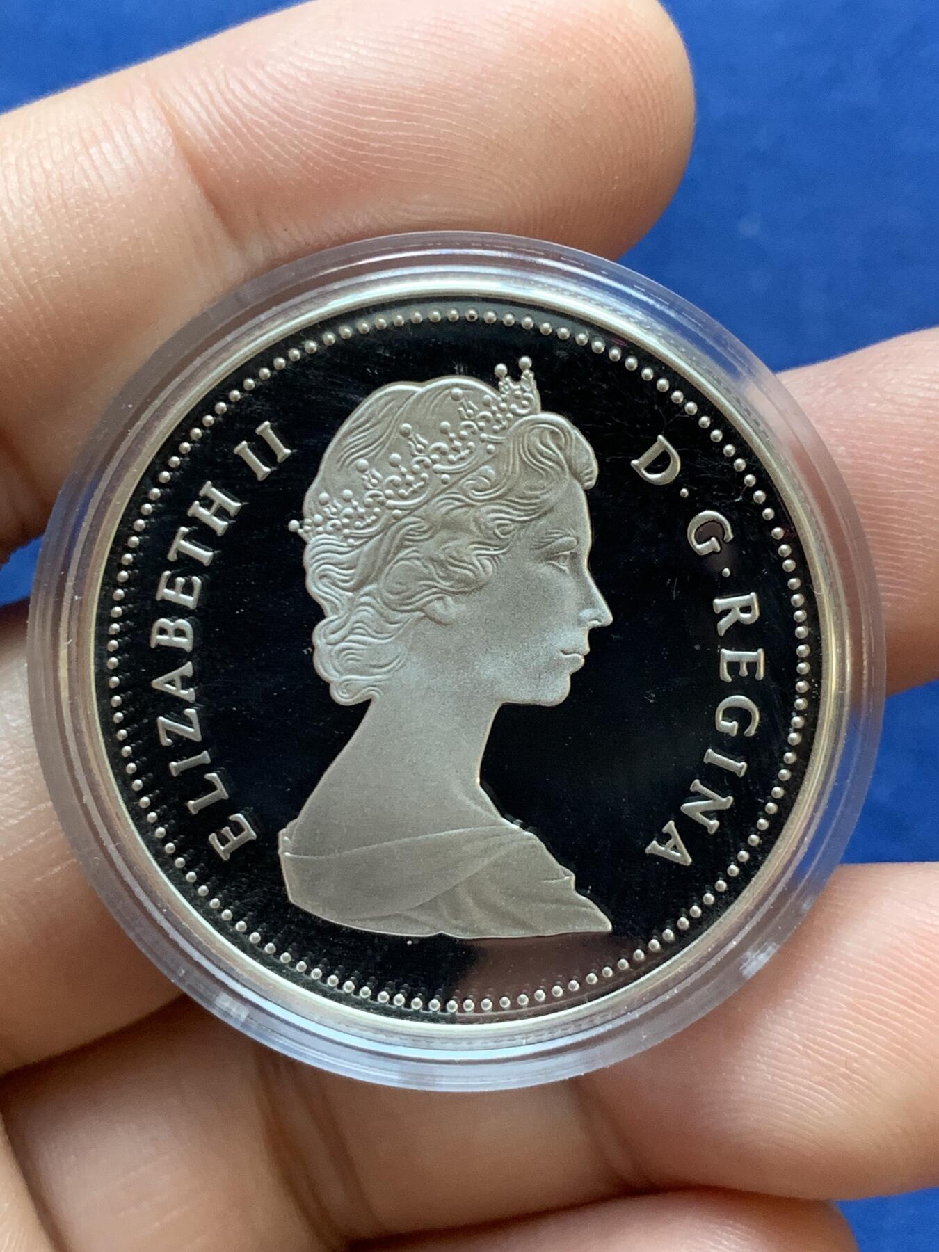 《竞宝斋》第295场- 周日，周一  2场连拍 （全场包邮） 加拿大1986年温哥华百年纪念银币 正面伊丽莎白二世 背面火车 带盒证