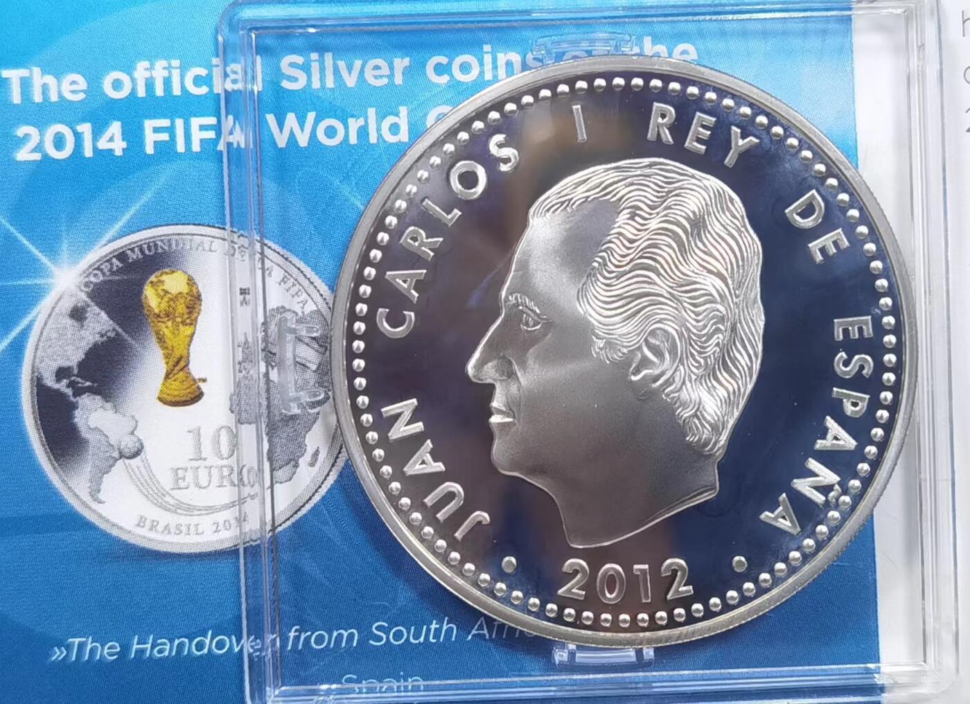 北京马甸外国币专卖微拍第124期，外国金银币专场，陆续上新，欢迎关注  西班牙2012年10欧元镀金精制纪念银币.巴西2014世界杯.重量27克，成色925