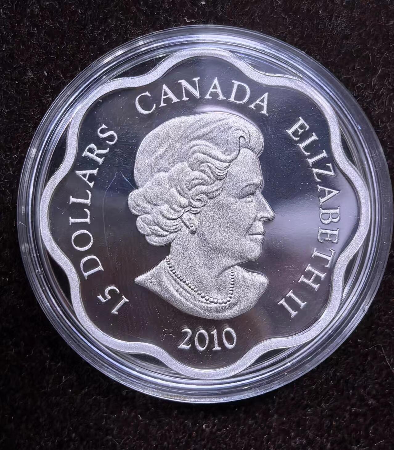 北京马甸外国币专卖微拍第124期，外国金银币专场，陆续上新，欢迎关注 漂亮的20120年加拿大梅花形生肖虎，盒证齐全，