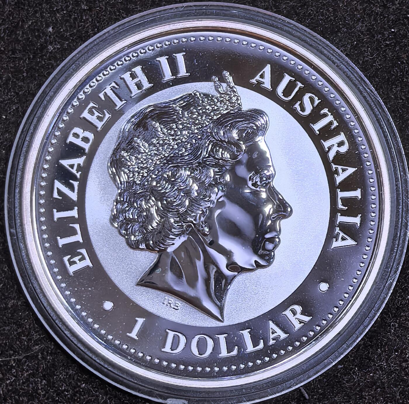 北京马甸外国币专卖微拍第124期，外国金银币专场，陆续上新，欢迎关注 2005年澳大利亚1盎司彩色生肖鸡银币