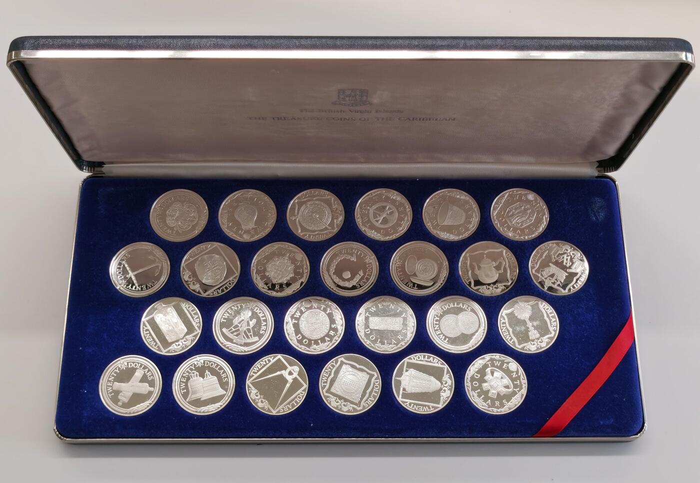 博洋堂世界钱币拍卖第087期（全场包邮） 近期暴涨品种 罕见25枚大珍精制银套币 1985年英属维尔京加勒比珍宝系列20元 单枚19.09克 925银 38mm精制 原盒装，国内成交套数低于5套，币面转光精美，伊丽莎白中年装，这些银币的铸造技术和设计理念也体现了当时制币工艺的最高水平，成为了收藏家们追逐的对象
