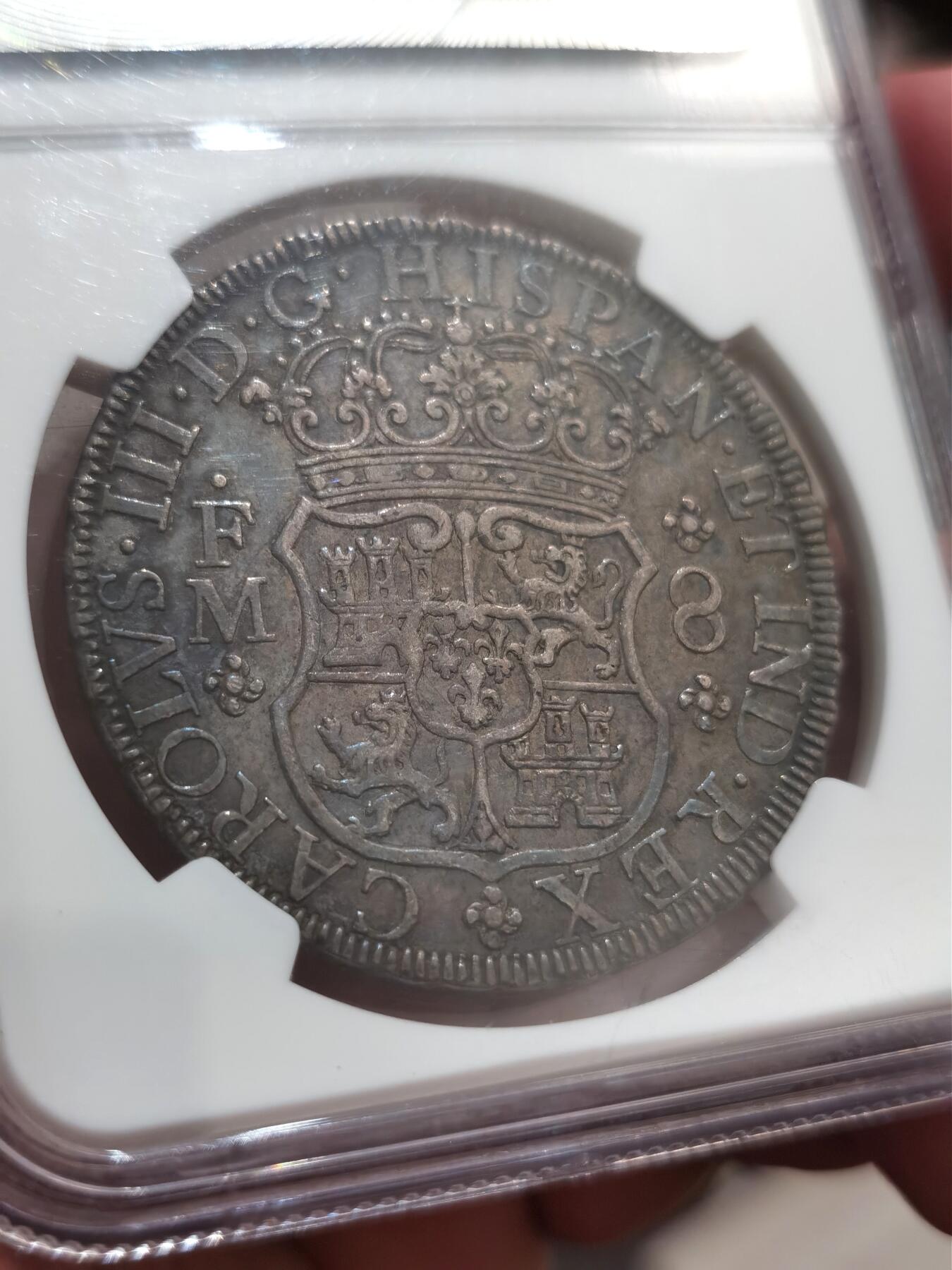 博洋堂世界钱币拍卖第087期（全场包邮） NGC XF45 包浆黑得均匀 1770年墨西哥地球双柱，8R主币，币面完整，地球上的地图，大陆和海洋边缘还清晰可见，字口立体，越看越喜欢，感觉被低评了。