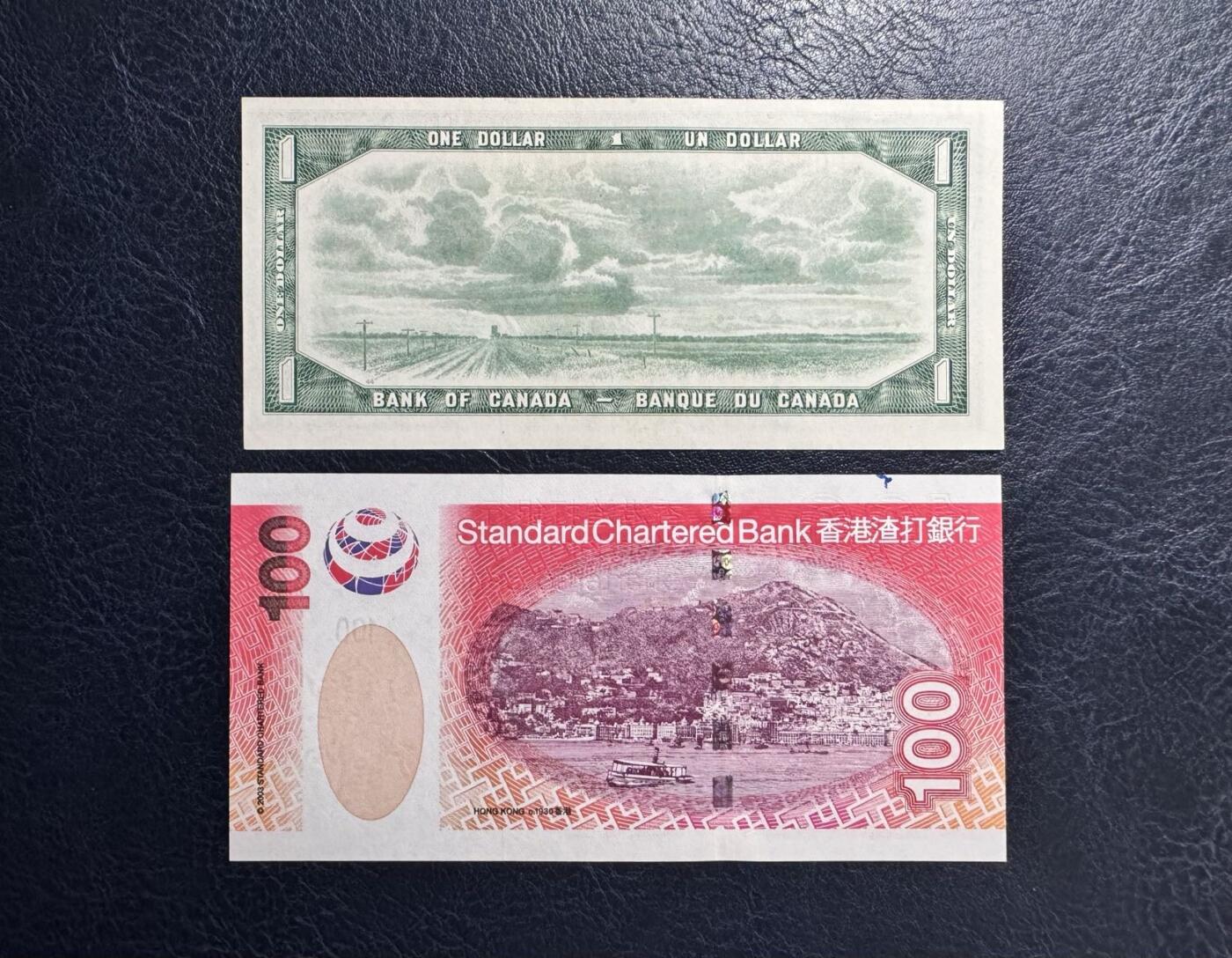 收藏联盟Quantum Auction 第367期拍卖  加拿大1954年1元豹子号和渣打银行2003年100元老虎号 品相UNC-  注意细节图
