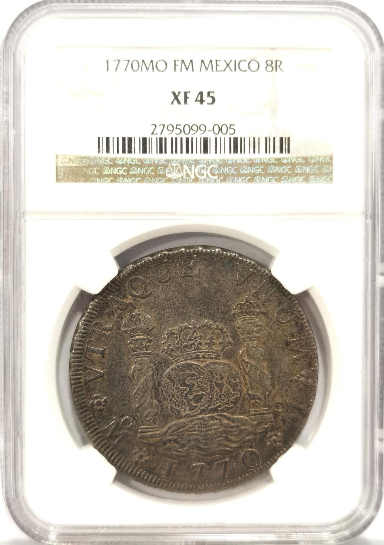 博洋堂世界钱币拍卖第087期（全场包邮） NGC XF45 包浆黑得均匀 1770年墨西哥地球双柱，8R主币，币面完整，地球上的地图，大陆和海洋边缘还清晰可见，字口立体，越看越喜欢，感觉被低评了。