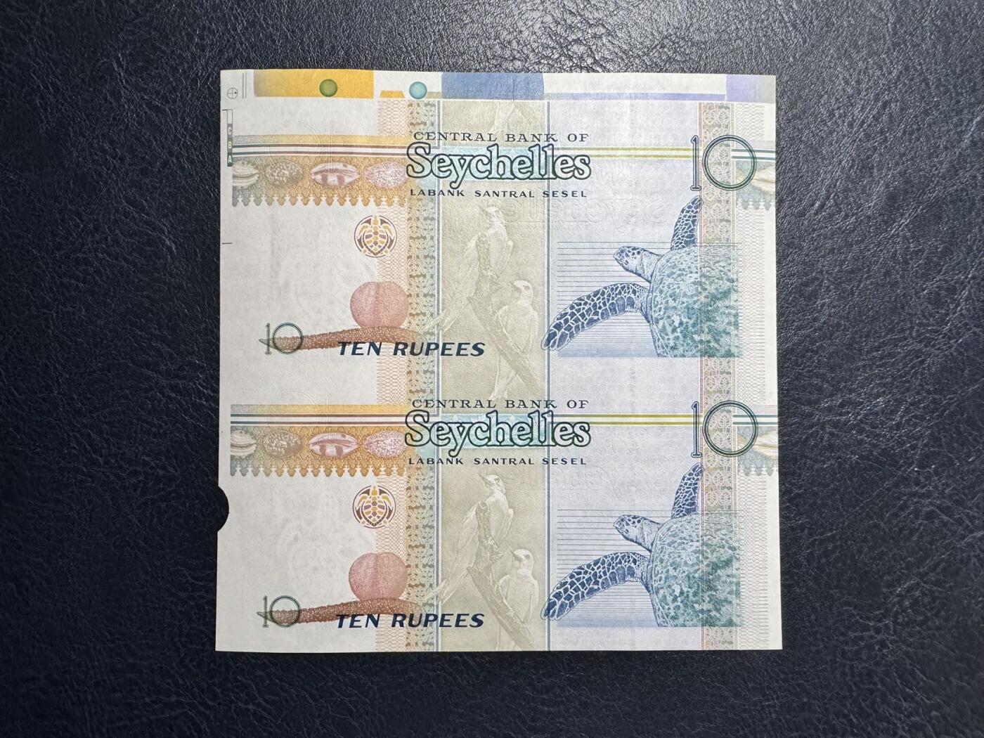 收藏联盟Quantum Auction 第367期拍卖  塞舌尔2013年10卢比两联体 品相UNC 剪裁原因自然弯曲
