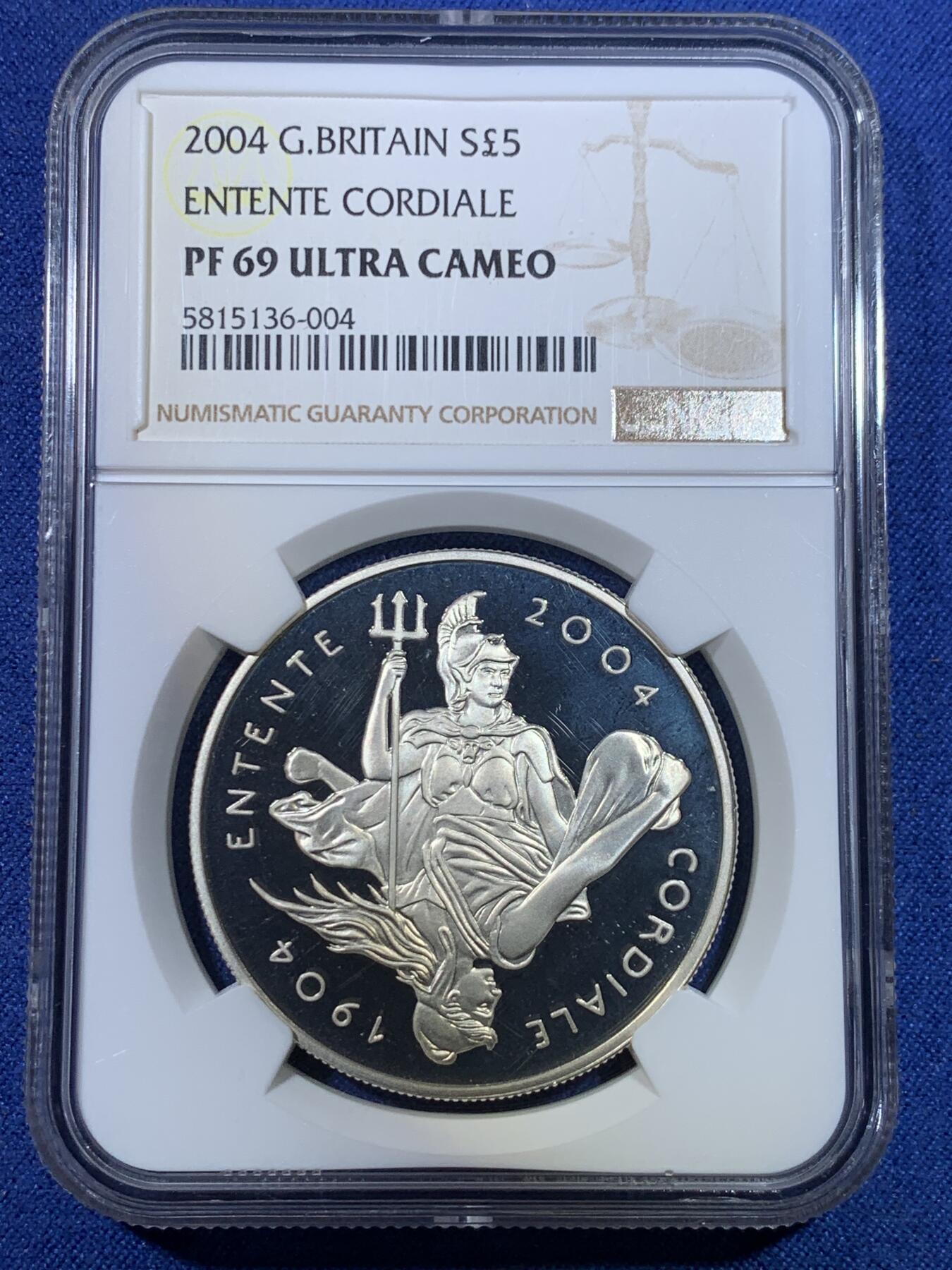 《竞宝斋》第296场- 周日，周一  2场连拍 （全场包邮） NGC PF69UC 英国2004年《英法挚诚协定》缔结100周年5英镑精制纪念银币（历史上也叫《英法协约》，代表一战前协约国联盟关系的形成） 单枚 精制币 28.28g 925银 38.61mm