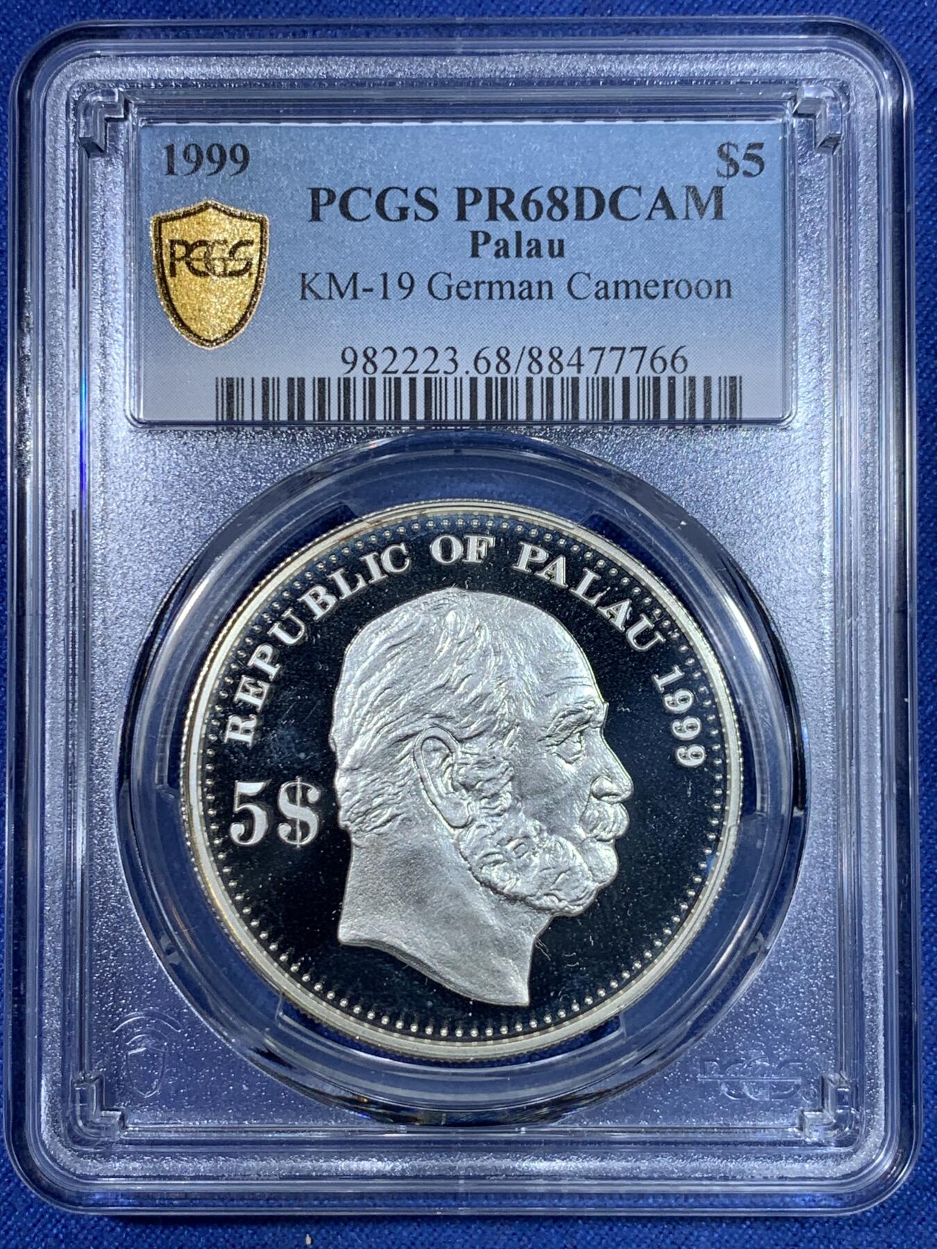 《竞宝斋》第296场- 周日，周一  2场连拍 （全场包邮） PCGS PR68DCAM 亚军分 帕劳1999年 日耳曼妮娅女神 5元精制大银币，纪念德属喀麦隆。克朗型大银，经典女神形象，BU品裸币市价约600元，pc更高分仅1枚