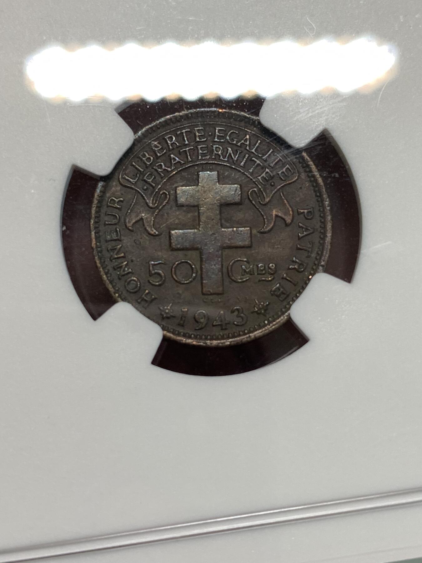 《竞宝斋》第296场- 周日，周一  2场连拍 （全场包邮） NGC AU50BN 自由法国1943年殖民地马达加斯加50分高卢雄鸡二战期间广泛流通 欧洲包浆高性价比之选 MS售价高