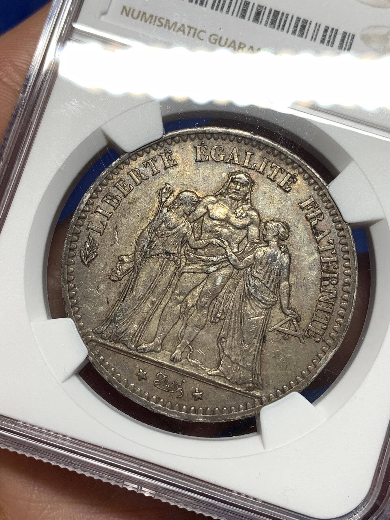 《竞宝斋》第296场- 周日，周一  2场连拍 （全场包邮） NGC AU55 法国1877年大力神5法郎大银币