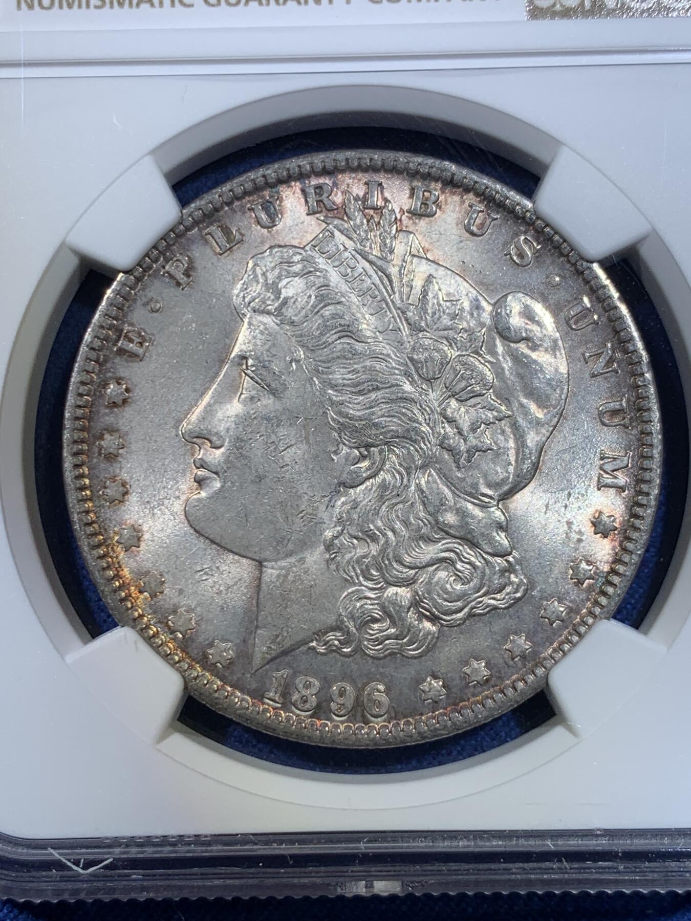 《竞宝斋》第296场- 周日，周一  2场连拍 （全场包邮） NGC MS63 美国1896年p版摩根银币 双面环彩 这枚的彩很漂亮