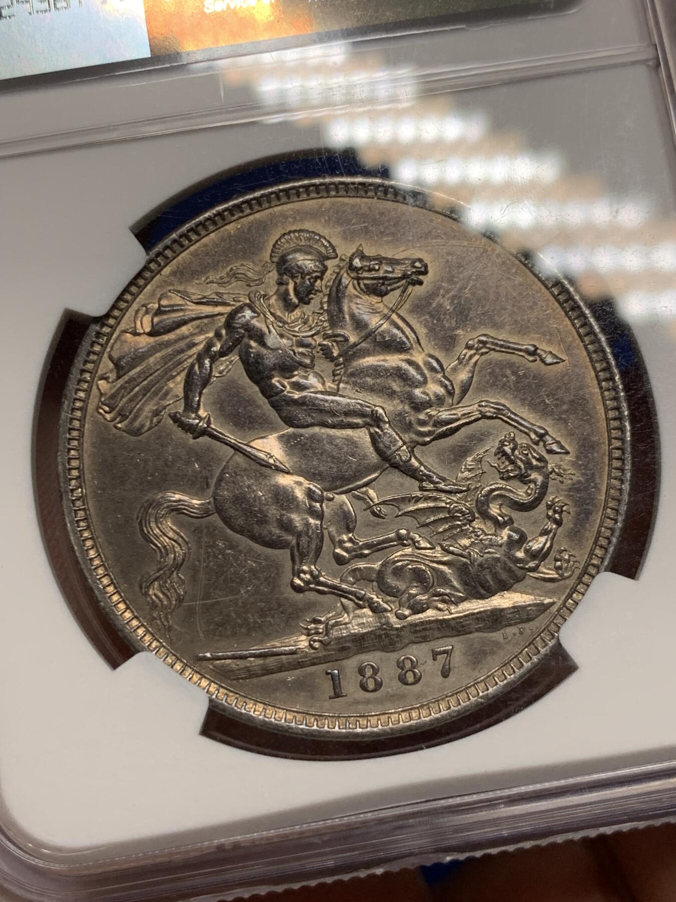 《竞宝斋》第296场- 周日，周一  2场连拍 （全场包邮） NGC AUD 英国1887年维多利亚高冠马剑1克朗