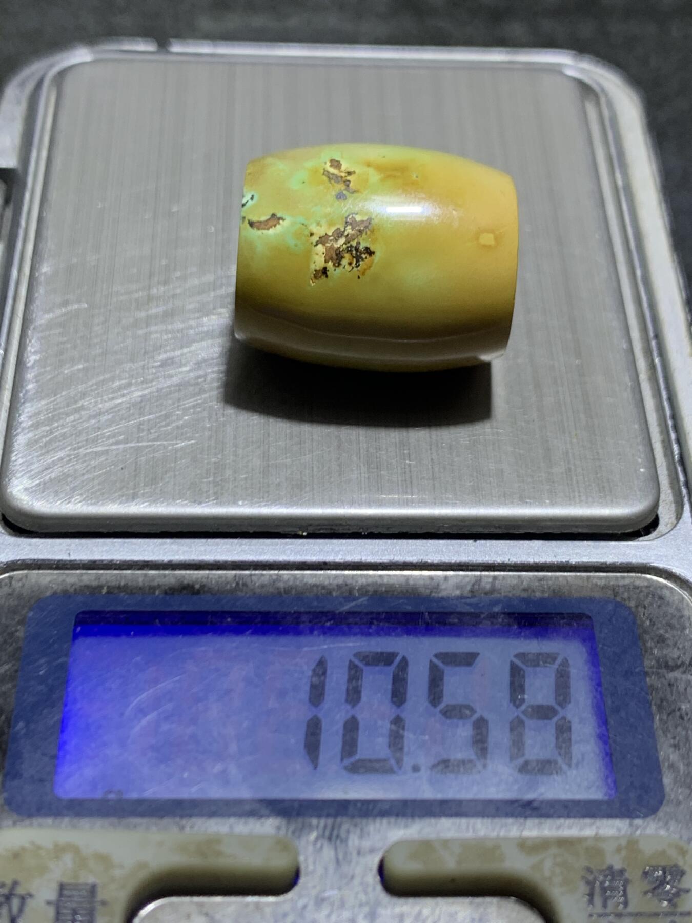 十堰高瓷土豪金俏色松石桶珠一颗