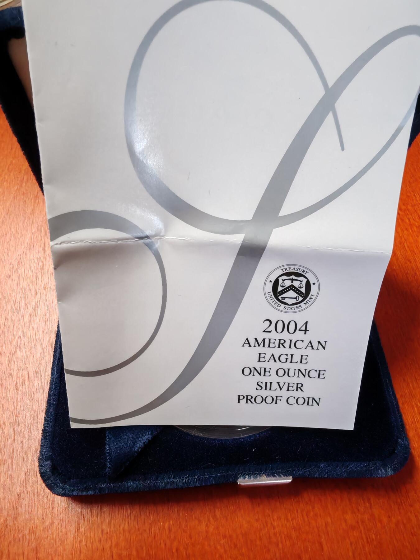 长老汇龙年精选第二十一场拍卖 2004美国行走女神1美元精制银币，盒证全