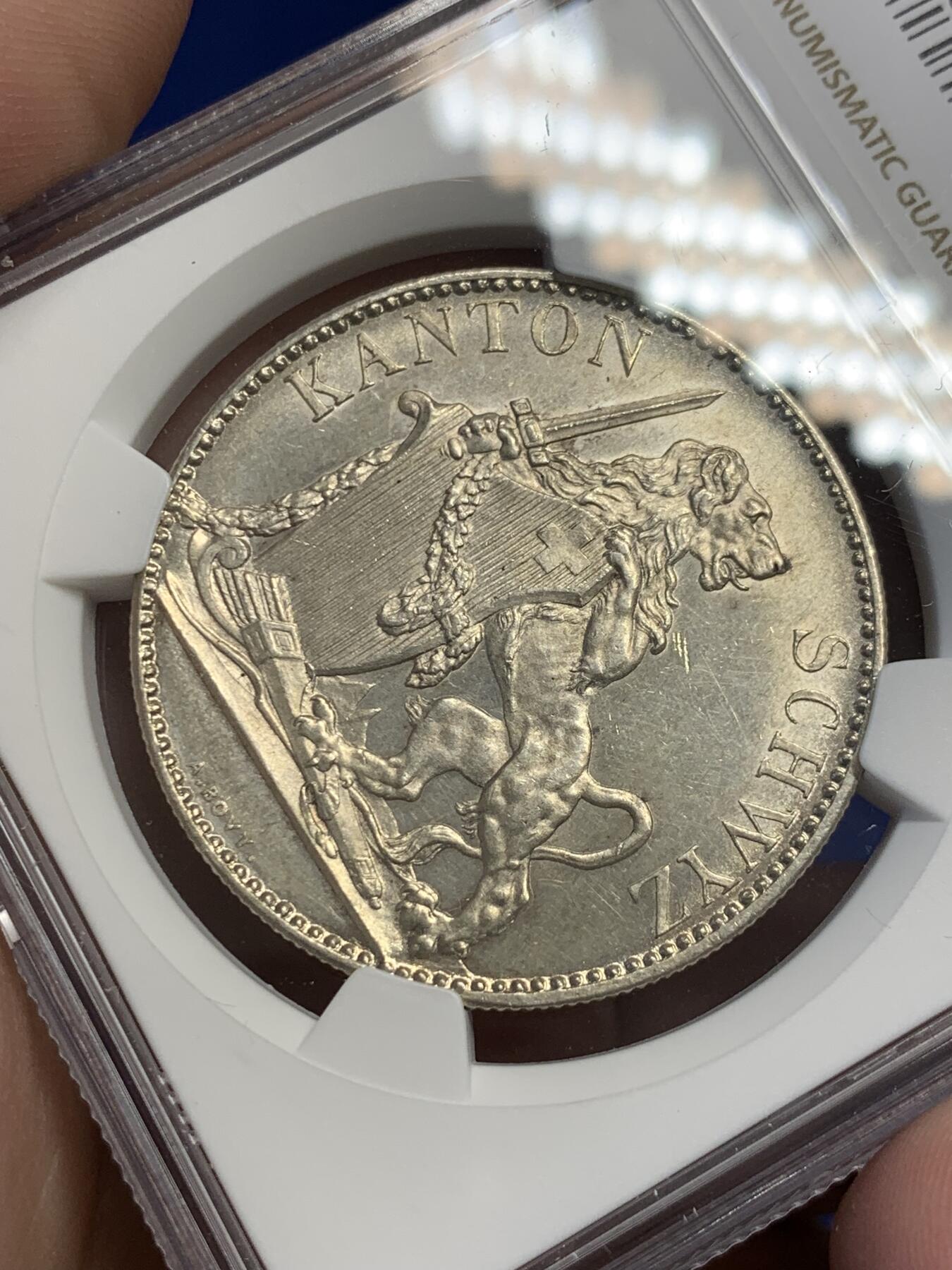 《竞宝斋》第297场- 周日，周一  2场连拍 （全场包邮） NGC UNC 瑞士1867年施维茨射击节5法郎银币 发行量8000枚 底板和光感都不错，可以试试砸盒养养包浆