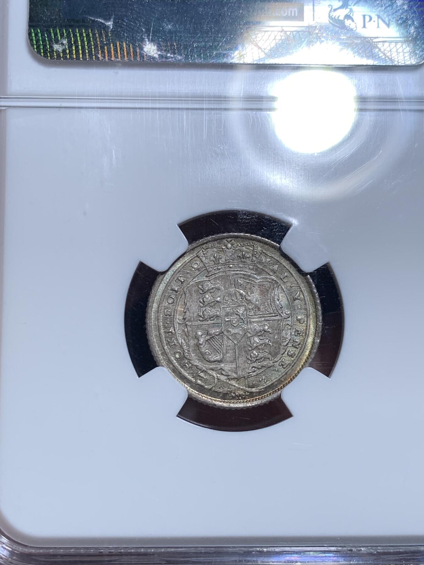 《竞宝斋》第297场- 周日，周一  2场连拍 （全场包邮） NGC MS65 1817年英国乔三牛头6便士银币，乔治三世。正面爆炸绚烂五彩，背面欧陆灰包浆。65收藏级高分，老N盒品质保障